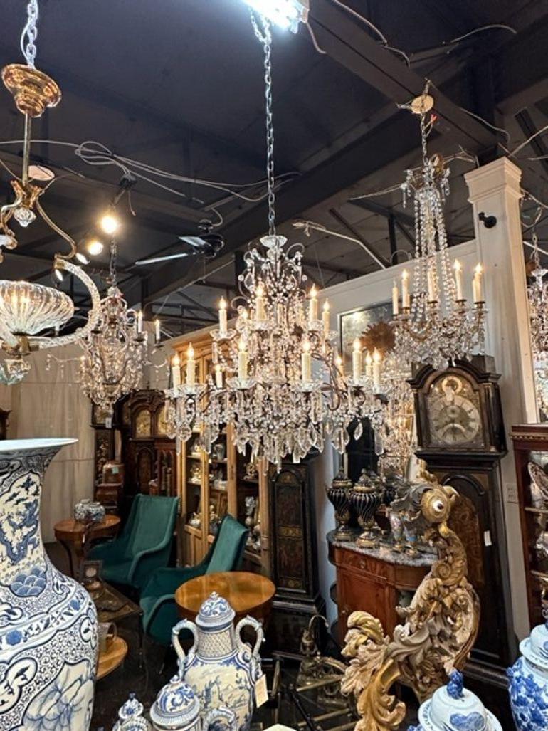 Elegant vintage Italian beaded crystal chandeliers with 16 lights. Beautiful shaping with an abundance of beads and crystals. Gorgeous! Note: Priced individually. There are two available.