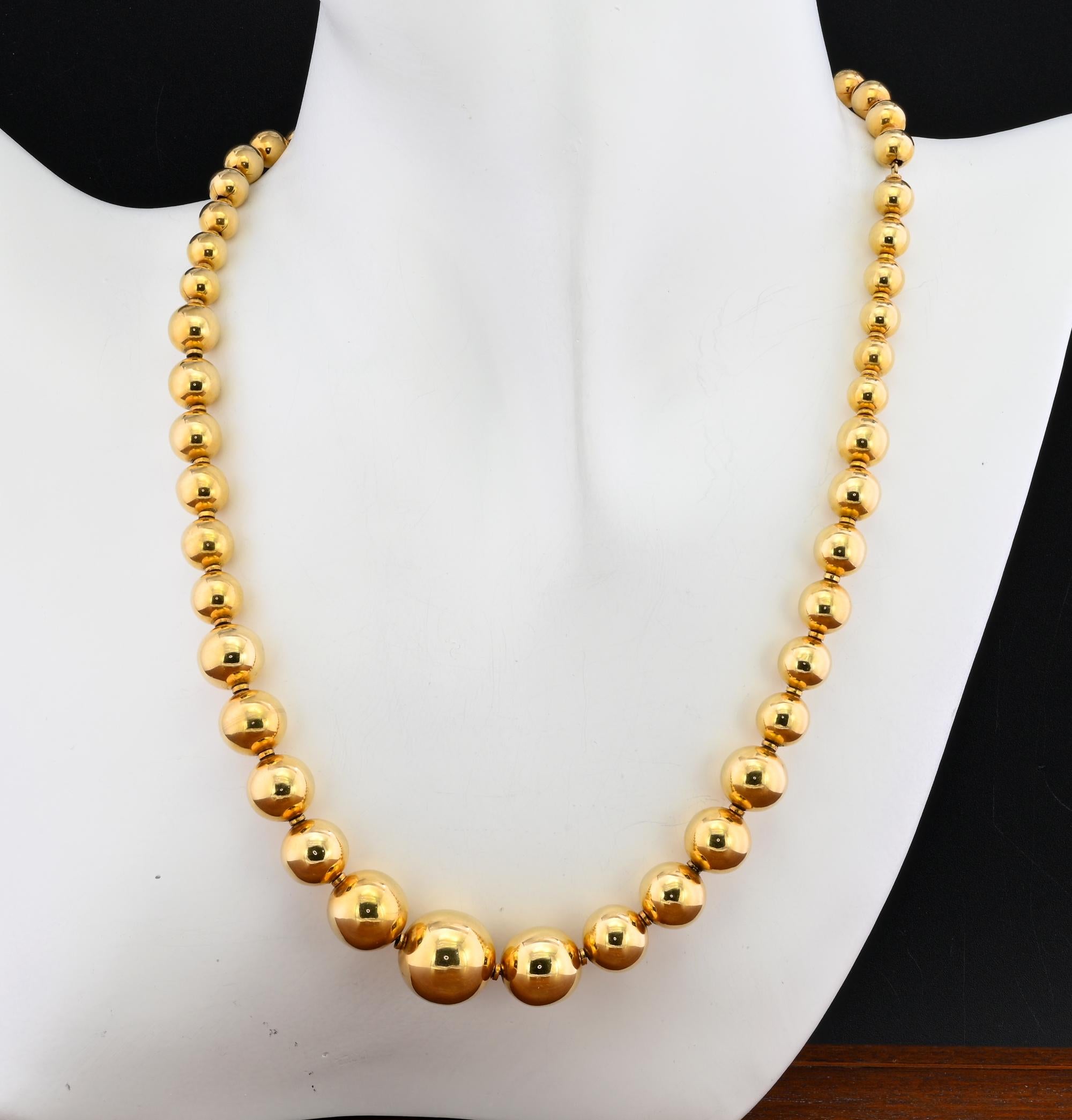 Simply exquisite vintage necklace 1945 circa, Italian origin
Beautifully hand crafted of solid 18 Kt gold, weighs 45 grams
Made by a composition of gold beads graduating from 14 mm. the biggest going down to 6.5 mm the smallest with closure