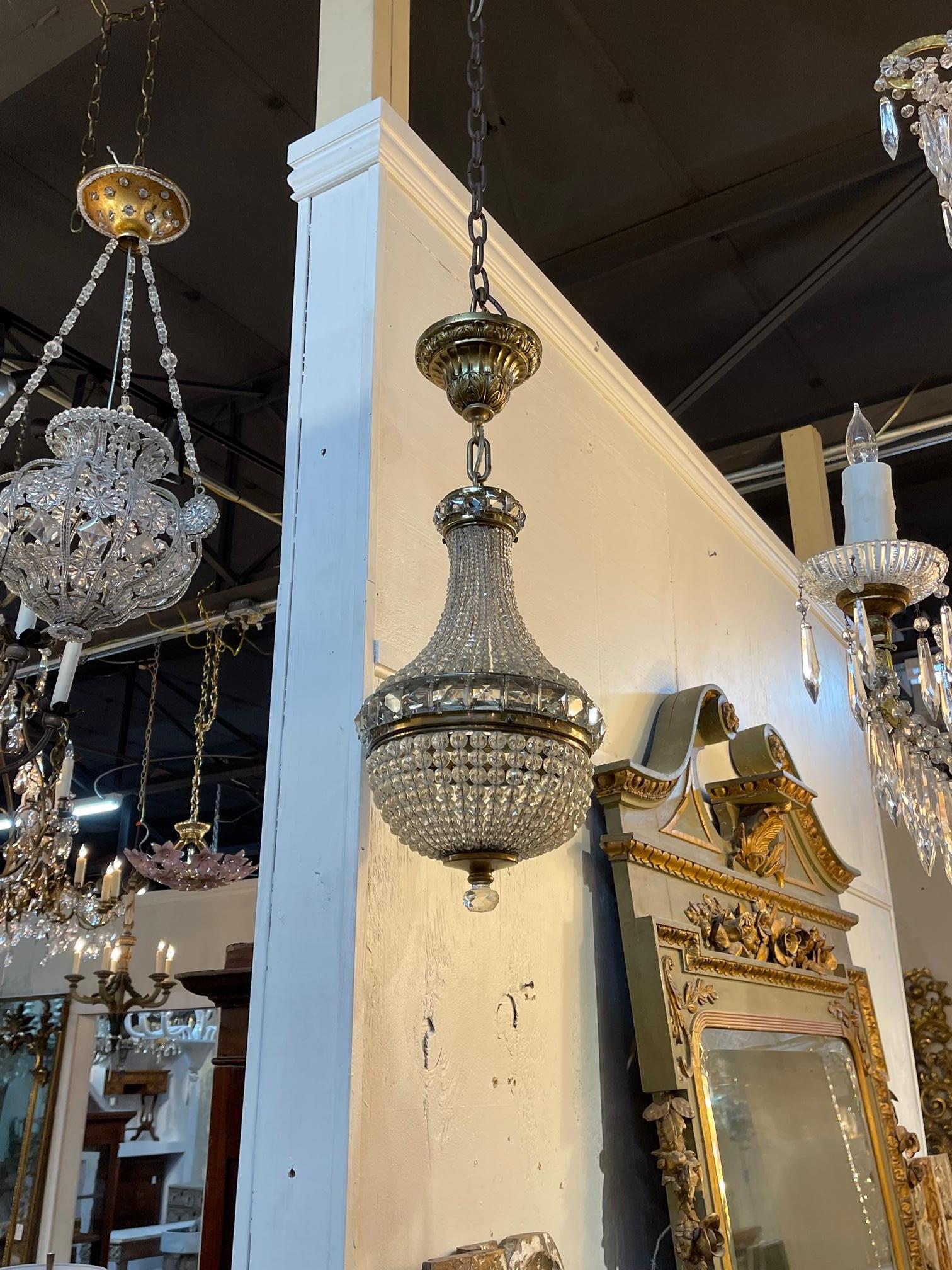 Vintage Italian beaded crystal pendant light, circa 1960. The chandelier has been professionally re-wired, cleaned and is ready to hang. Includes matching chain and canopy.