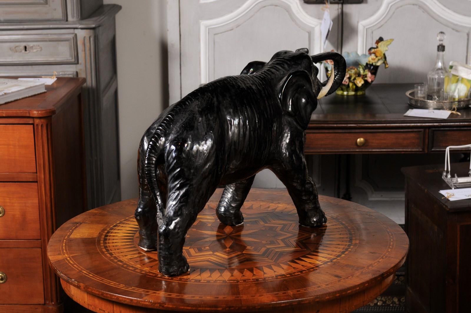 Vintage Italian Black Glazed Ceramic Sculpture of a Walking Elephant, Trunk Up For Sale 1