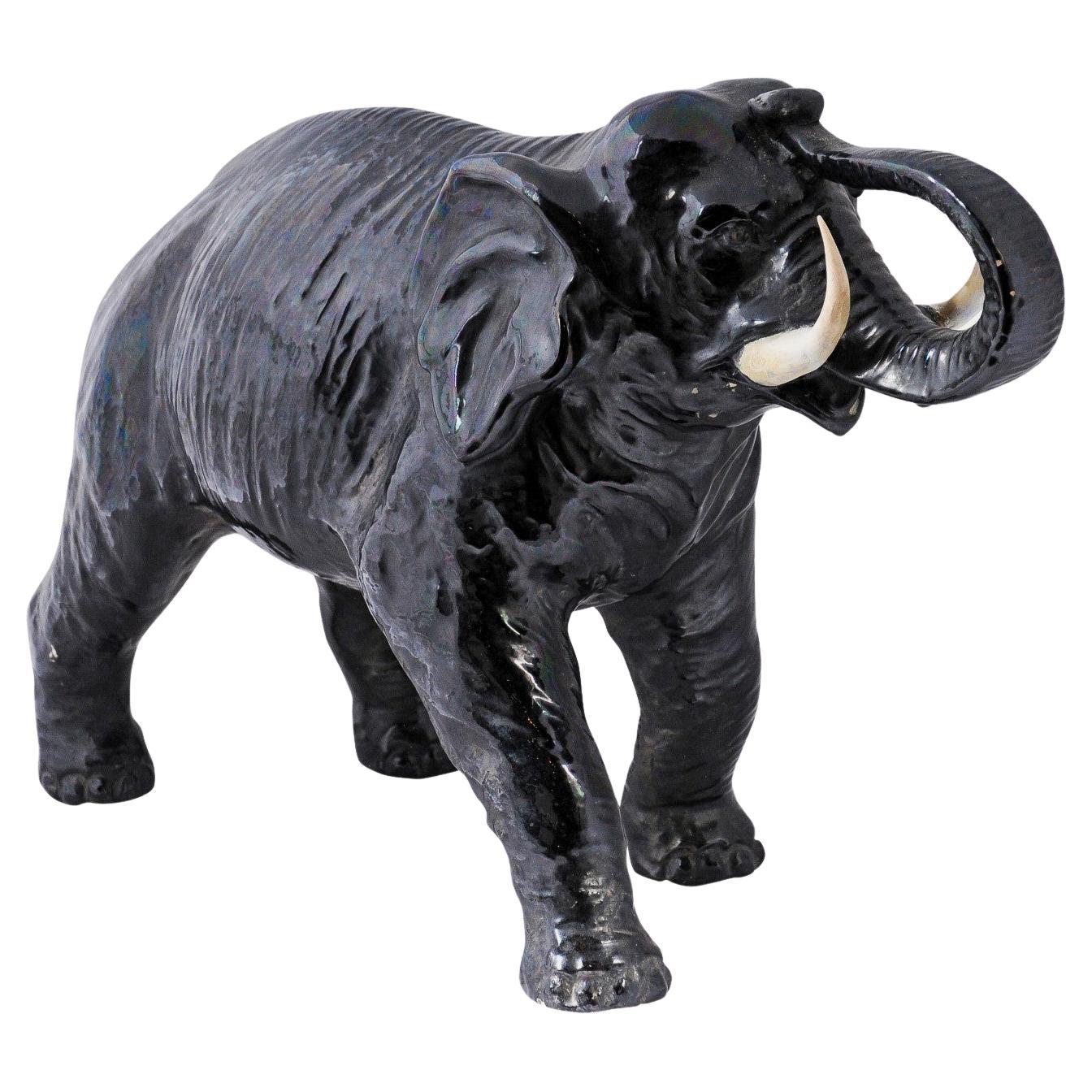 Vintage Italian Black Glazed Ceramic Sculpture of a Walking Elephant, Trunk Up