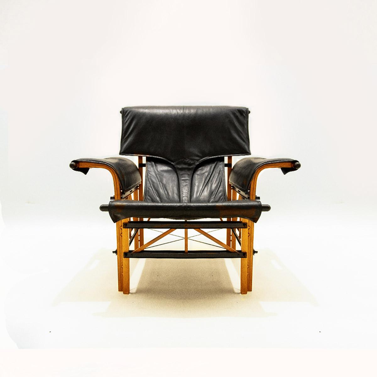 Post-Modern Vintage Italian Black Leather and Wood Lounge Chair