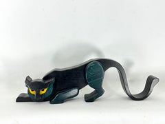 Vintage Italian black panther sculpture in thick wood. Italy 1980s