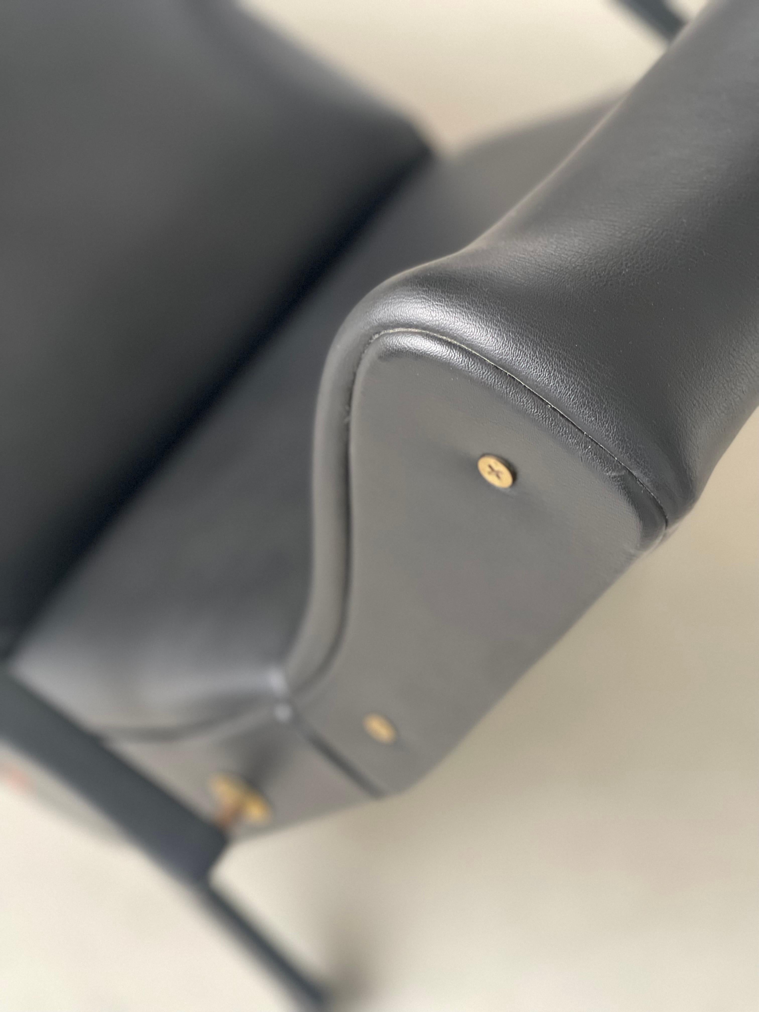Silla reclinable italiana vintage Borsani P40, cuero negro original en venta 7