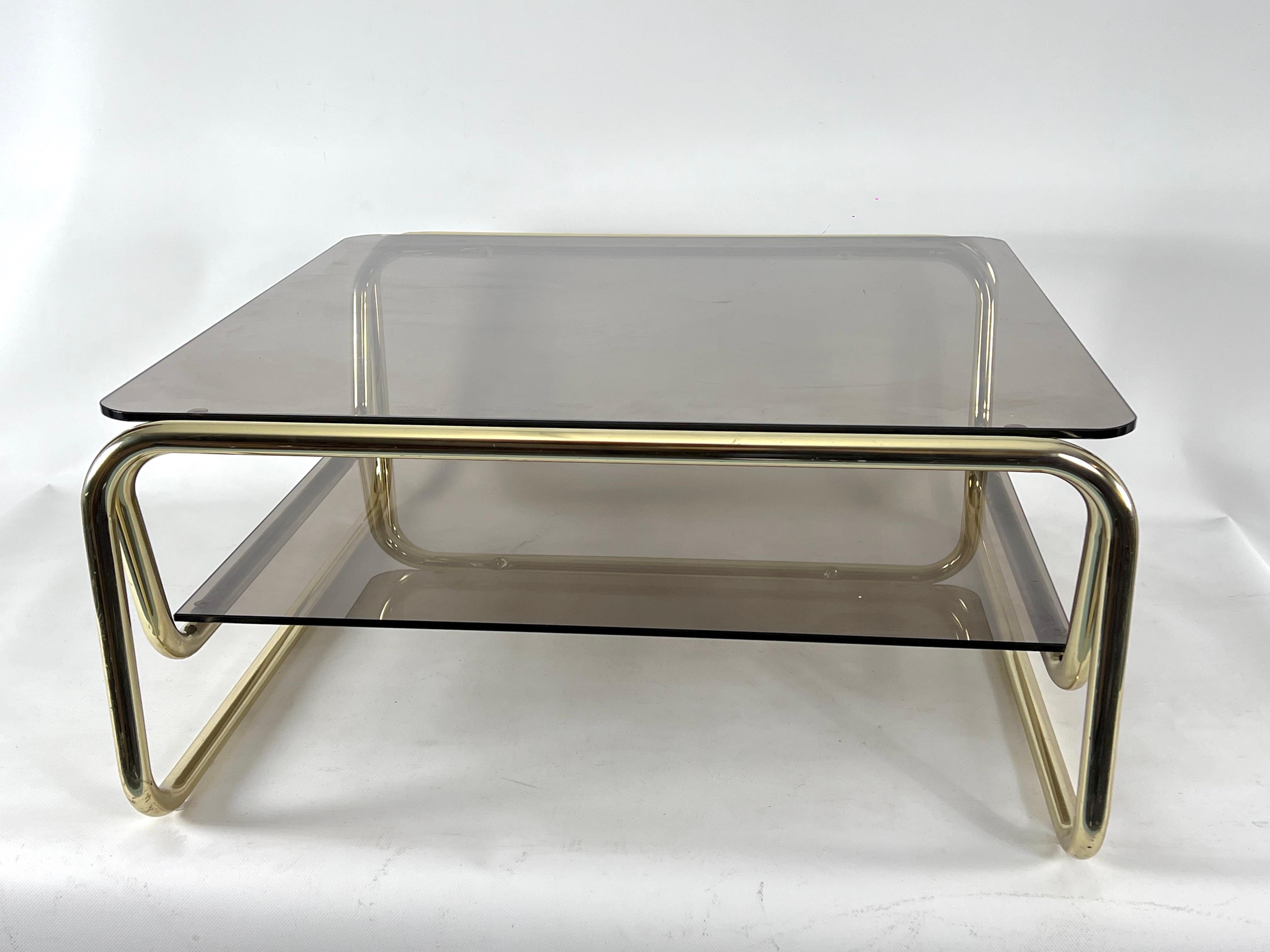 Excellent vintage condition with rare trace of age and use. No cracks or chips. Made from gilded metal and smoked glass

