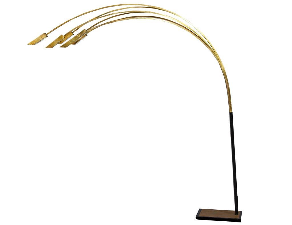 Outstanding vintage Italian brass arc floor lamp. Unique brass 6 faceted overhanging arches.