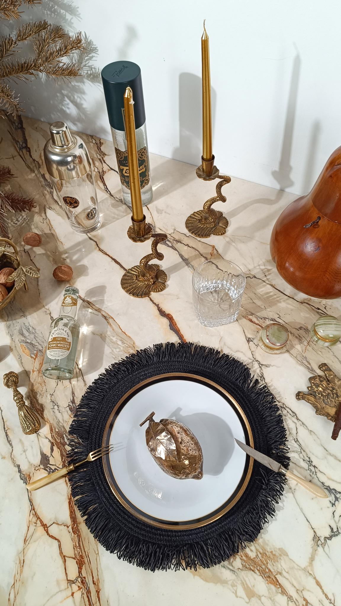 We are pleased to offer for sale a highly decorative vintage sculptural bottle opener that will not go unnoticed on your tabletop.
Shaped like a gilded Theatre Bullion Tassel, it was made in Italy, as indicated by the engraving on the back, in a