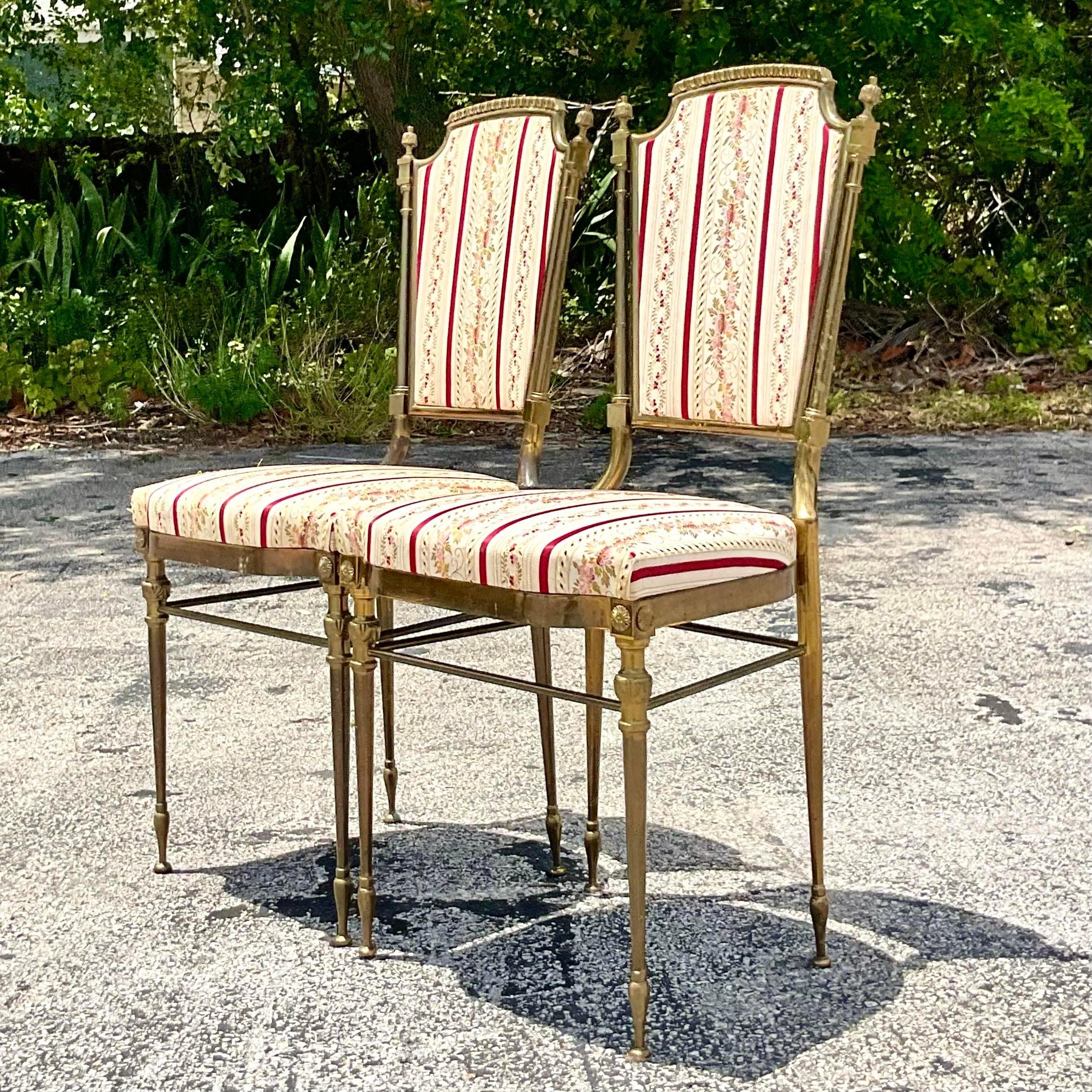 Add a touch of European elegance to your space with our Vintage Italian Brass Charvari Chairs - A Pair. Imported and cherished in American homes, these chairs combine Italian craftsmanship with classic American sophistication, offering timeless