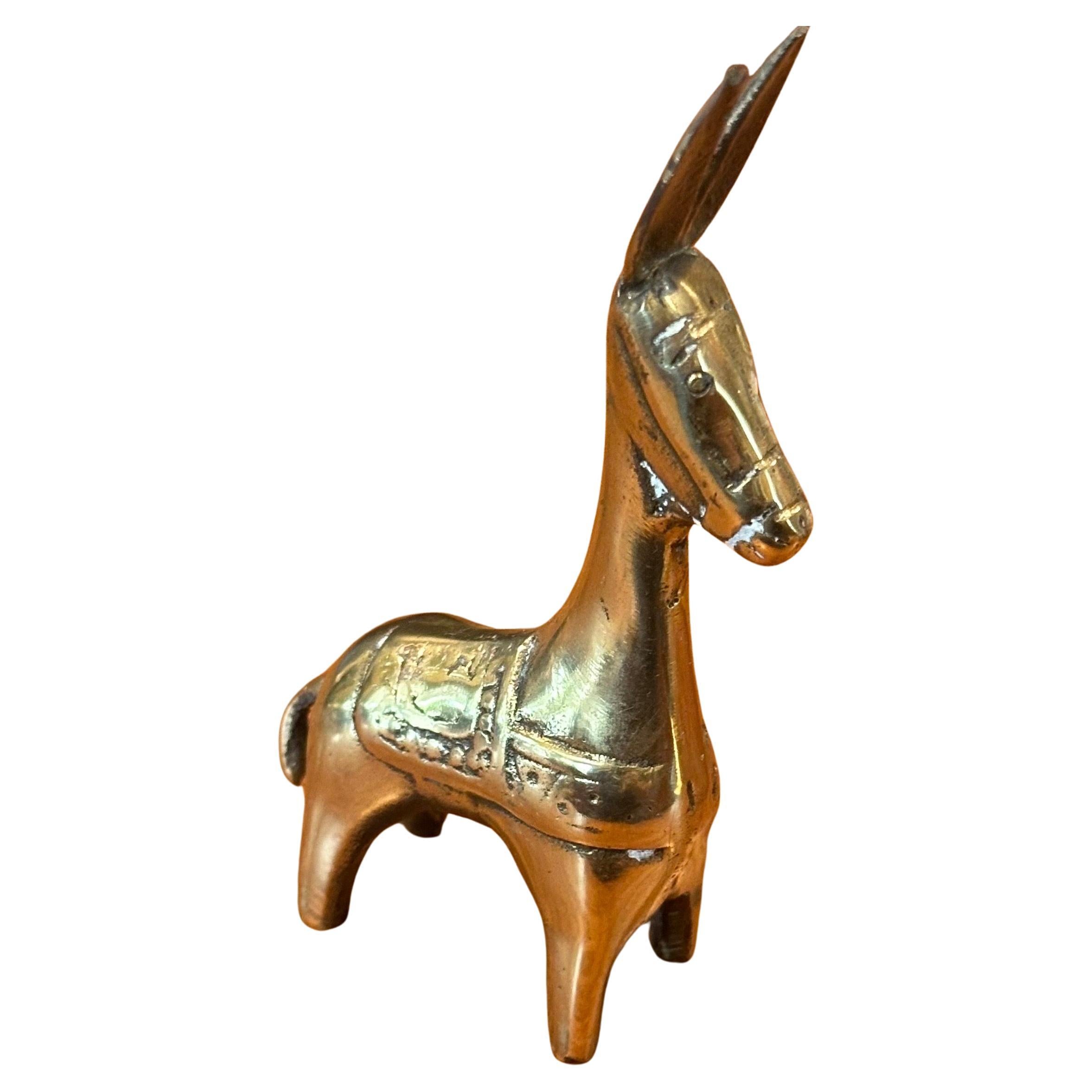 Whimsical vintage Italian brass donkey / burro paperweight or sculpture, circa 1950's.  The piece is in very good vintage condition with a great patina. 
 and measures 3