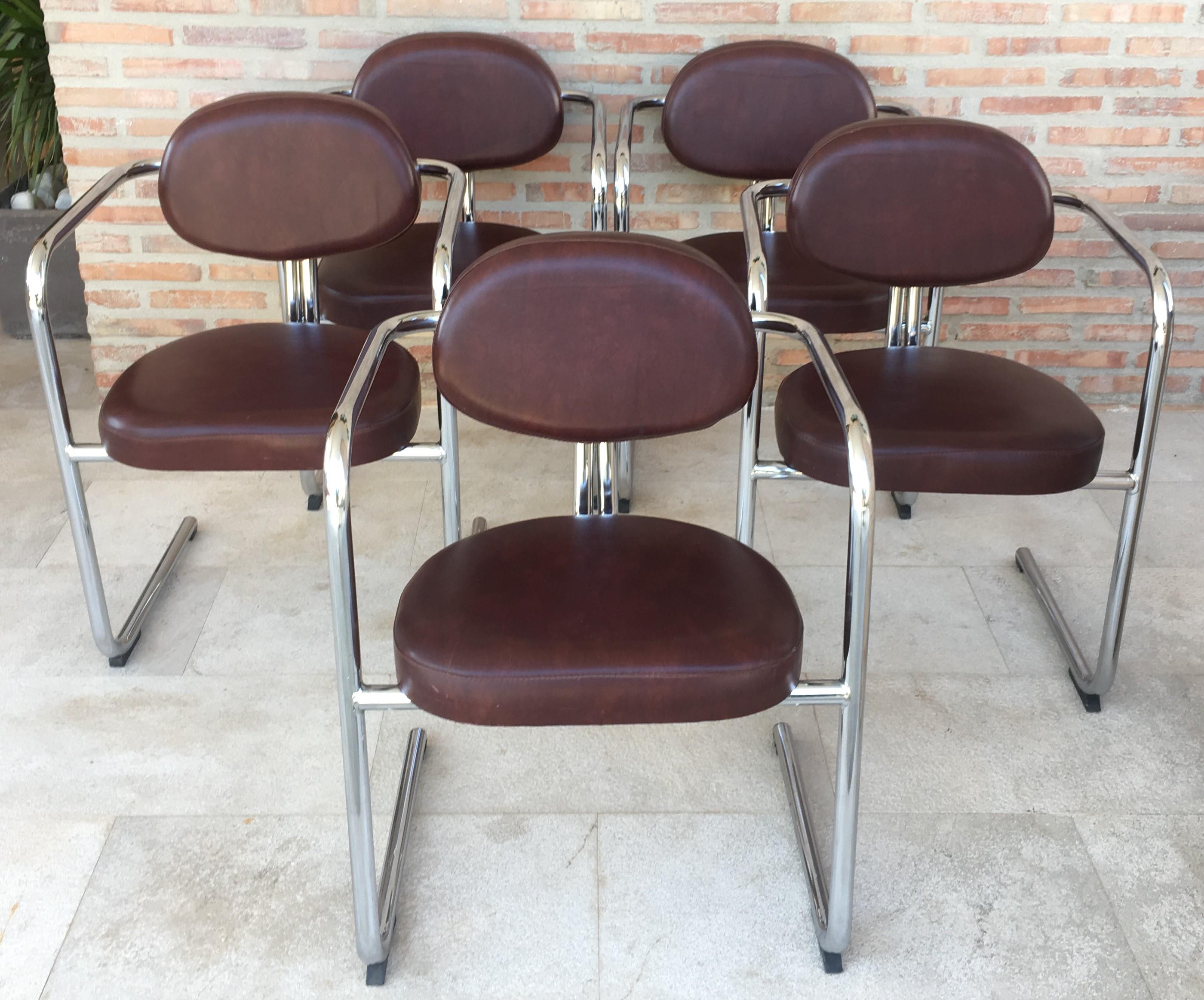 Vintage Italian brown leather and chrome armchairs, 1980s, set of five.