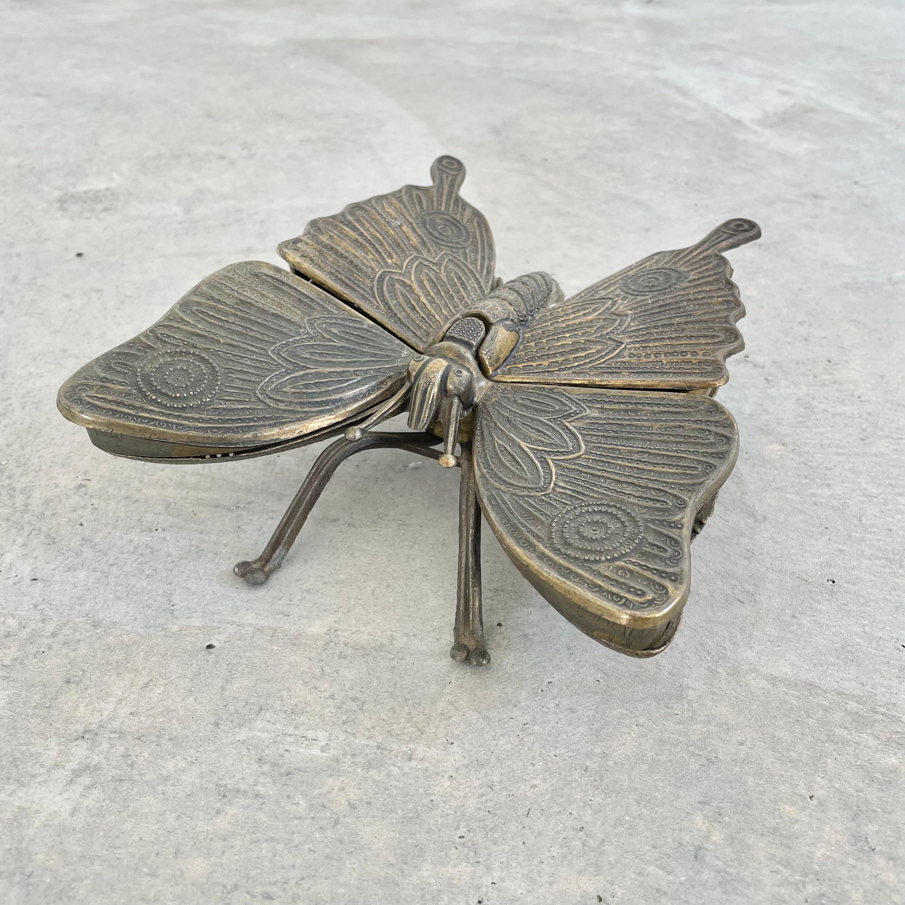 Gorgeous Butterfly ashtray. Circa 1970s. Made in Italy, marked inside wing as pictured. This large scale butterfly can be used as an ashtray or decorative object. A collectable mid-century box with stunning detail on the wings. The overall metal