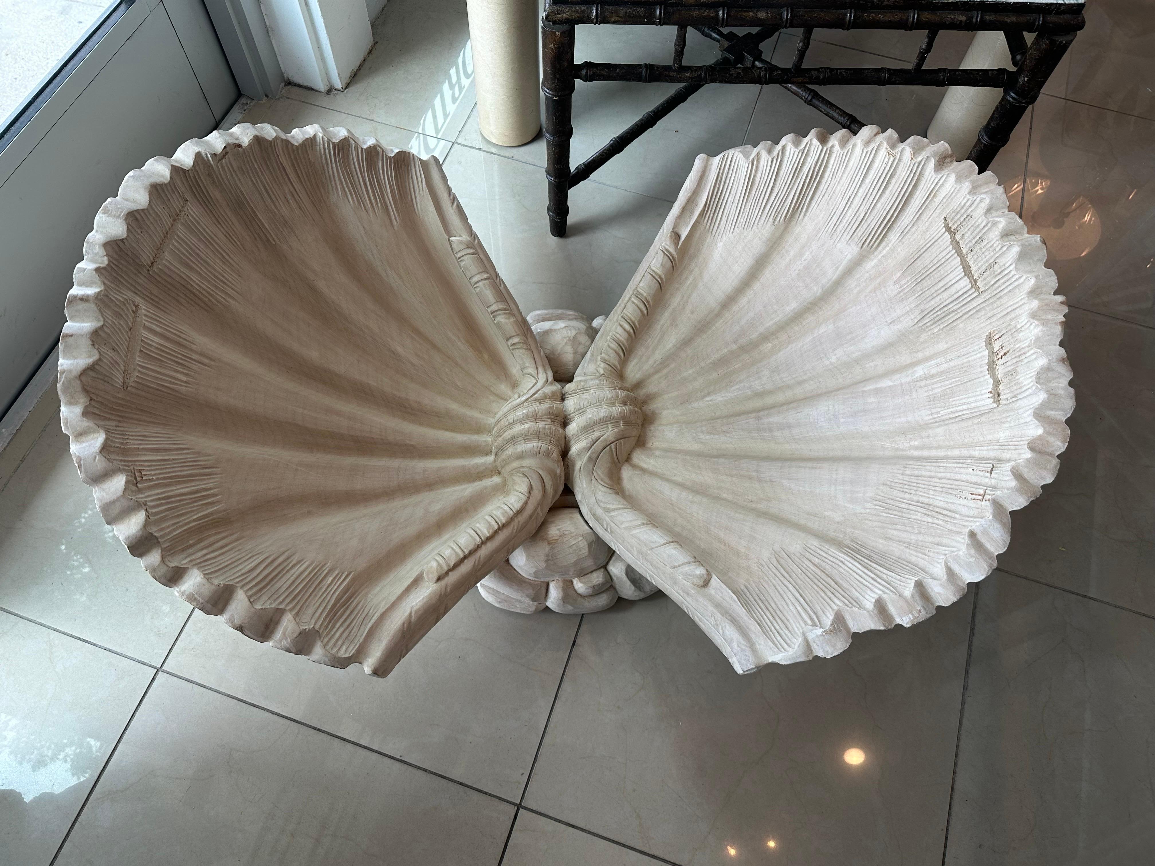 Amazing vintage Italian wood carved scalloped clam shell coffee cocktail table. Original wood finish. Comes with original glass which has some scratches. You may want to replace the glass. Dimensions: 18 H x 39.5 W x 28 D.