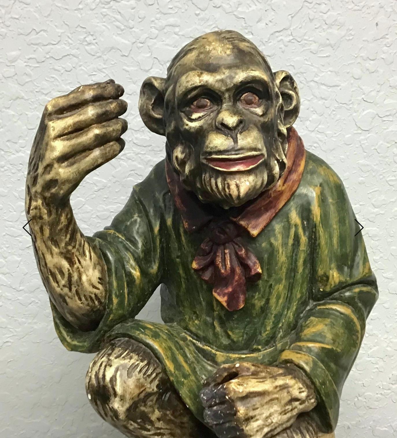 Vintage Italian Venetian hand carved wood sitting monkey. Very well carved and realistic look. Painted finish with monkey sitting on silver gilt rock base. Wonderful old worn patina to the original painted finish. Great decorative one of a kind