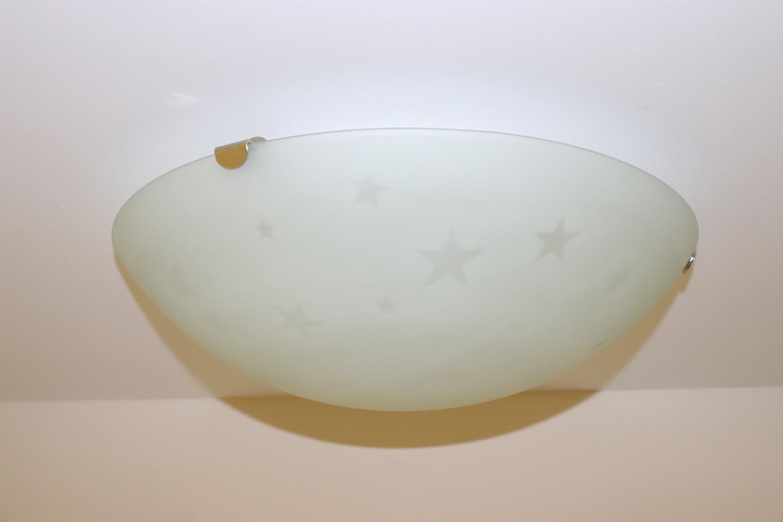 Vintage Italian ceiling lamp Murano crystal satin glass with stars details.
Designed by Carlo Nason and manufactured by Murano Due.
Mounting: White lacquered metal with brushed nickel details.
Dimensions: Diameter 17.50