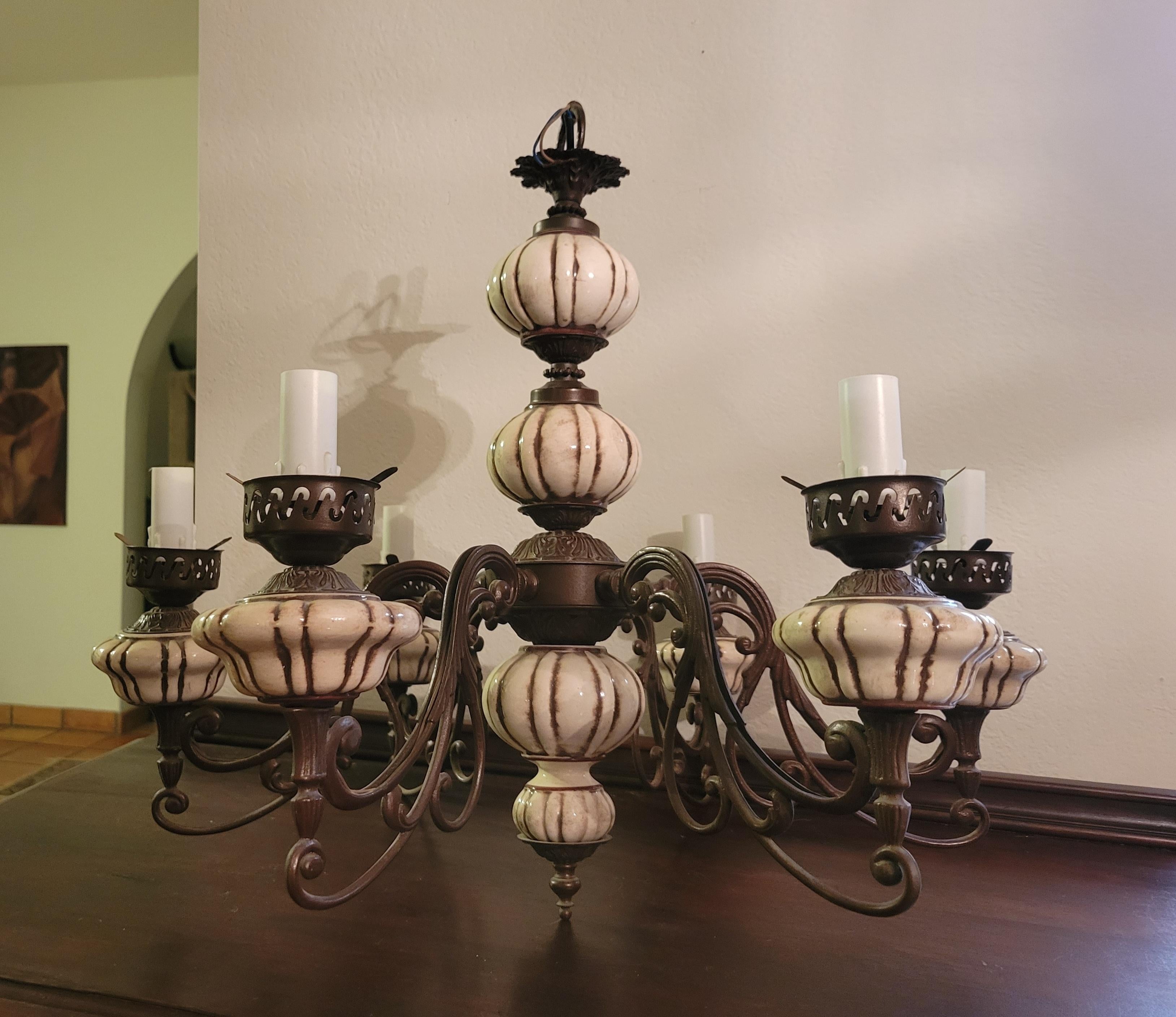 This vintage, mid-century, ceramic Italian 6-light chandelier is 24