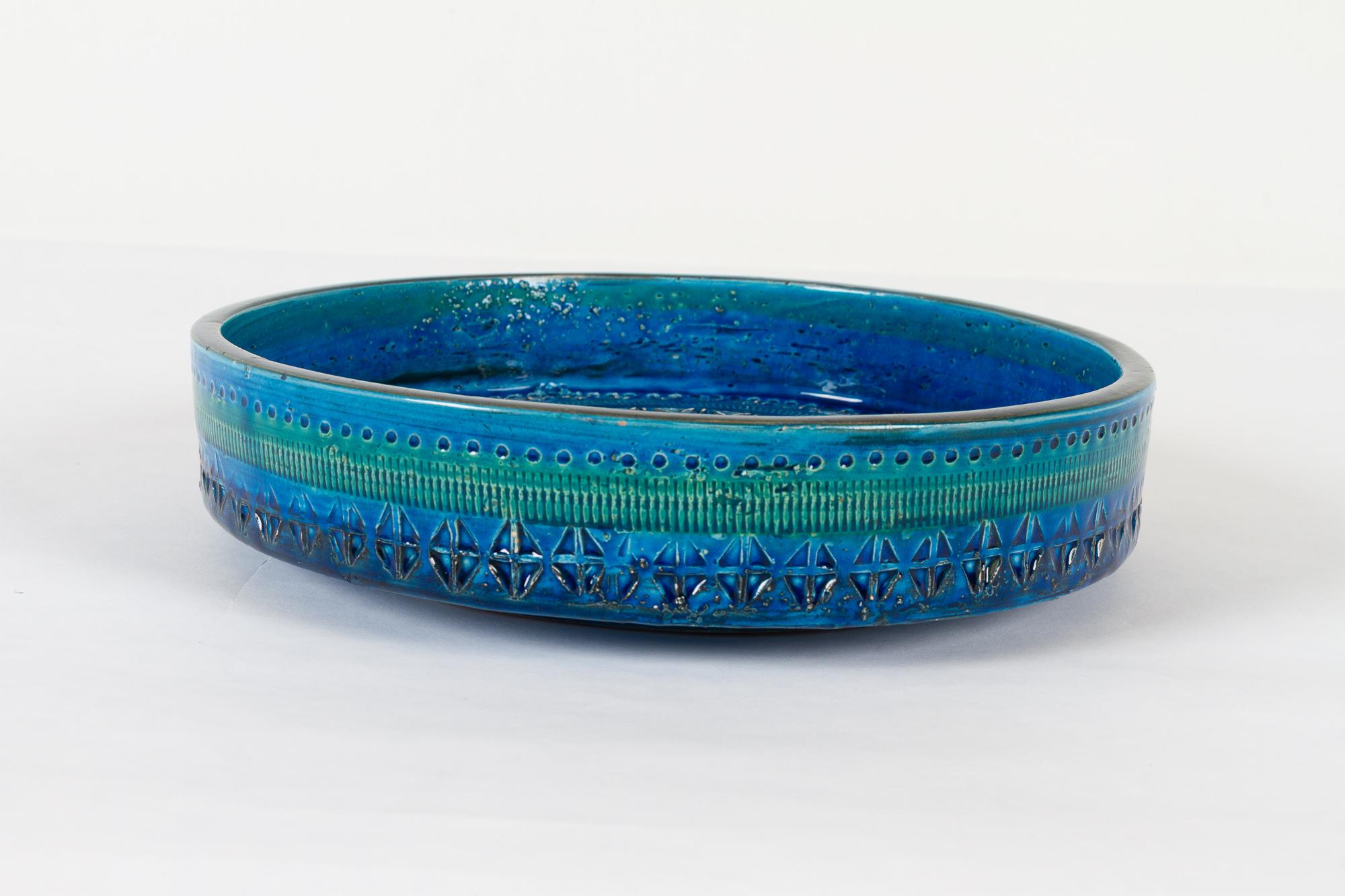 Vintage Italian ceramic bowl by Aldo Londi for Bitossi 1960s
Large handcrafted ceramic bowl in Rimini Blu glace.
Expressive blue, turquoise and green colors
Made for Illums Bolighus, Denmark. (Department store)
Very good condition, no cracks.
 