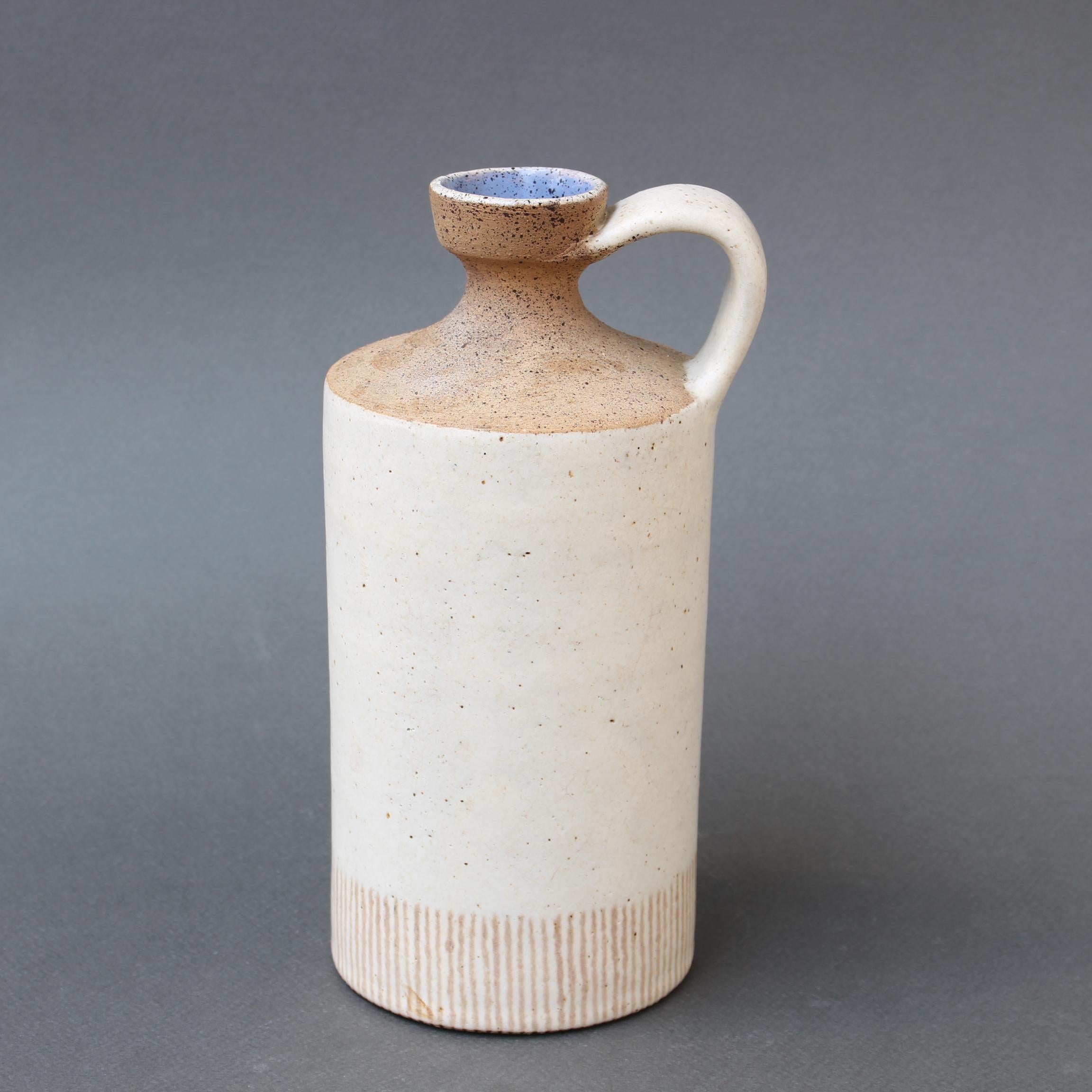 Italian ceramic decorative jug / vase by Bruno Gambone (circa 1970s). The vessel has a purity of form, muted colour and demonstrated effortless beauty that is only created by Bruno Gambone. He transforms earthenware ceramics into works of art. With