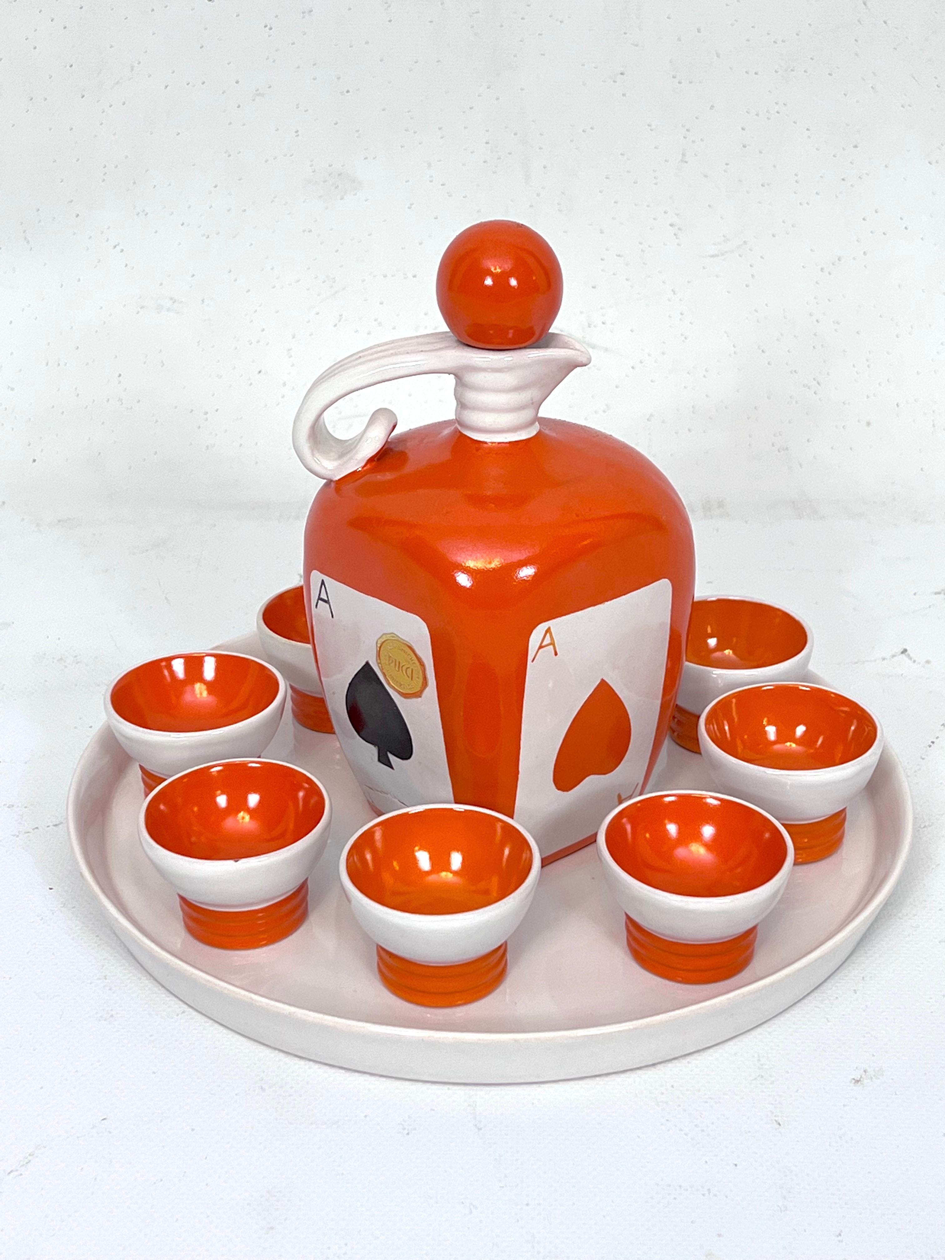 Good vintage condition with normal trace of age and use for this ceramic liquor set produced in Italy by Pucci Umbertide during the 50s. The set consists of a serving plate, a decanter and eight drinking cups.
 
