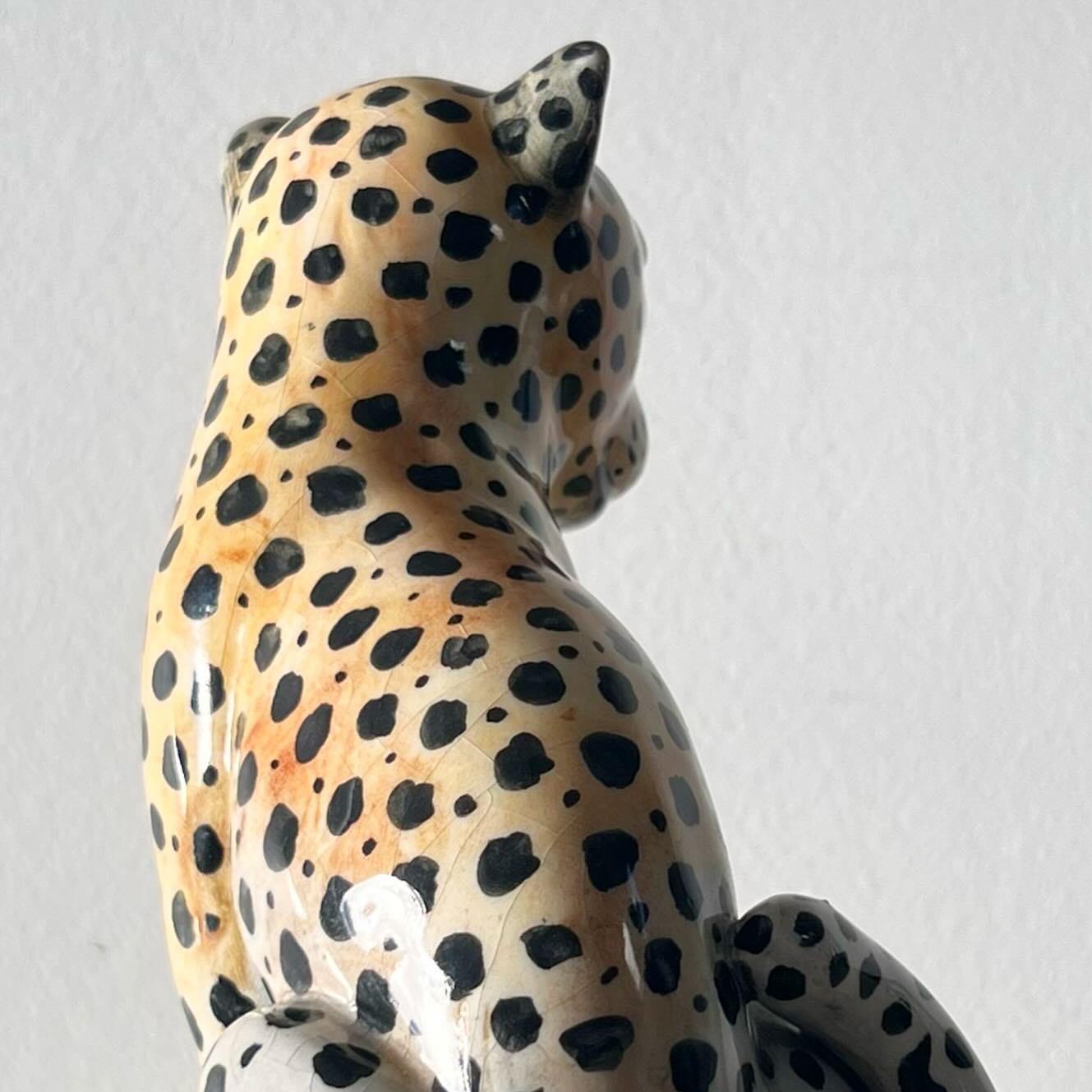 Mid-Century Modern Vintage Italian ceramic sculpture of a leopard, mid 20th century. 