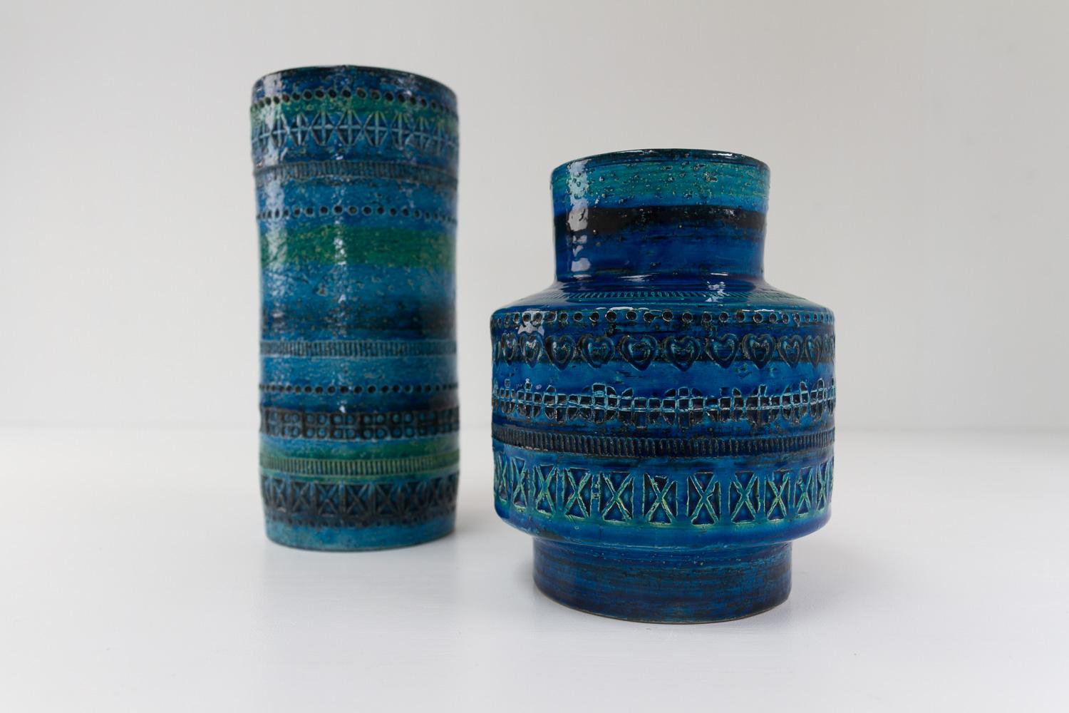 Vintage Italian Ceramic Vases by Aldo Londi for Bitossi 1960s. Set of 2.
Pair of handcrafted cylindrical ceramic vases in Rimini Blu glace with expressive blue, turquoise and green colors.
Tall vase: Diameter 10 cm, height 23 cm. Stamped: 43130/92