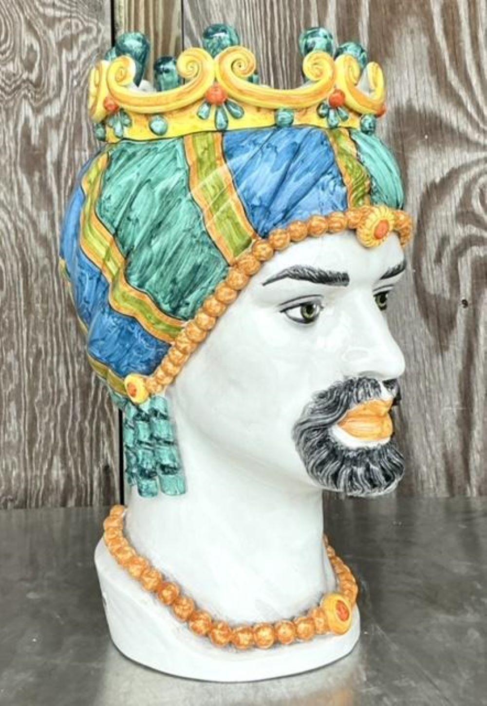 This exquisite vintage planter from Ceramiche Di Caltagirone showcases the timeless artistry of Italian ceramic craftsmanship. Hand-painted with vibrant colors and intricate detailing, this planter features a regal figure adorned with a crown,