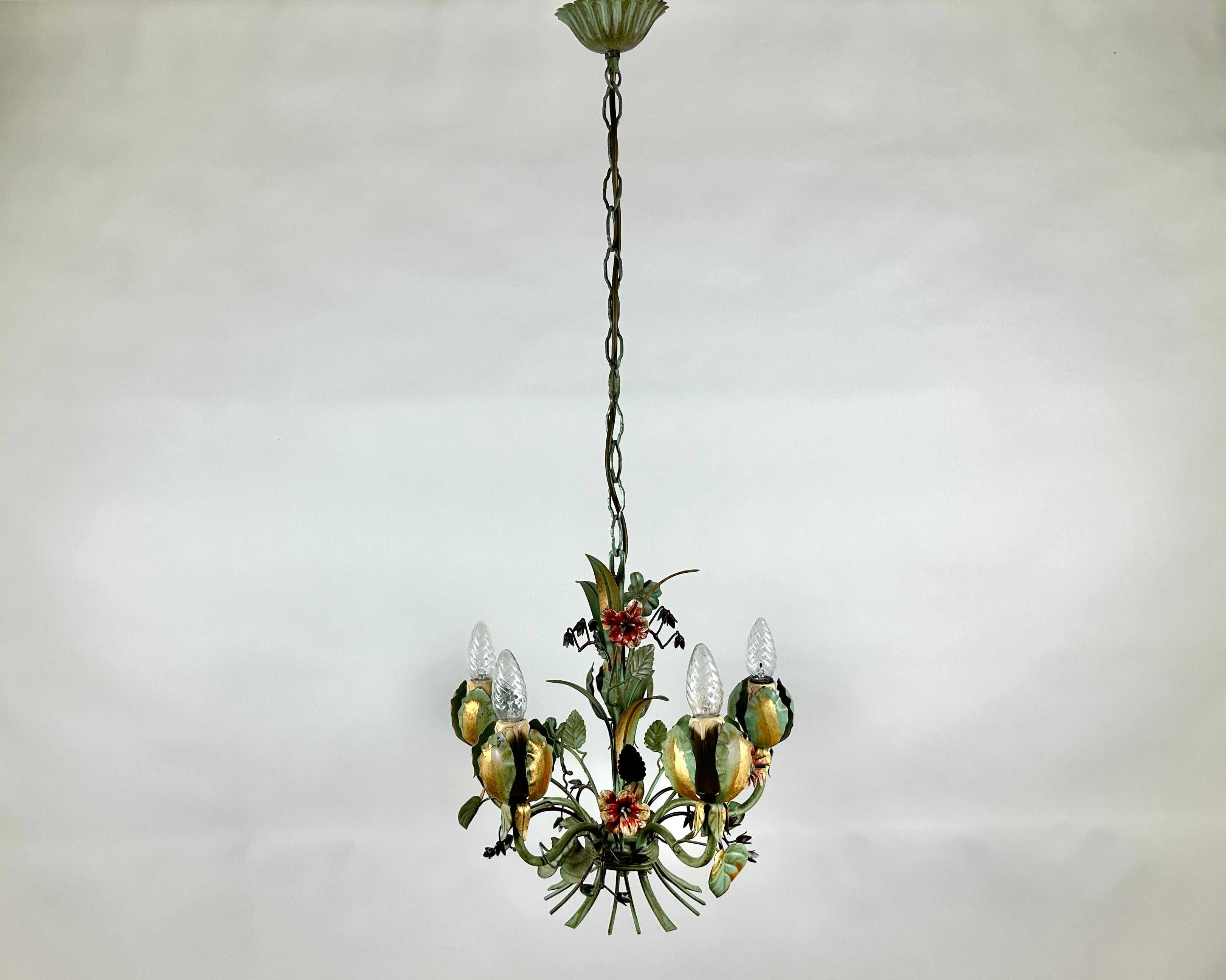 Absolutely breathtaking vintage chandelier, crafted in Italy during the vibrant heart of the Mid-Century era. Circa 1960s.

This magnificent piece is a true testament to Italian design and craftsmanship, exuding an incredible aura of elegance and