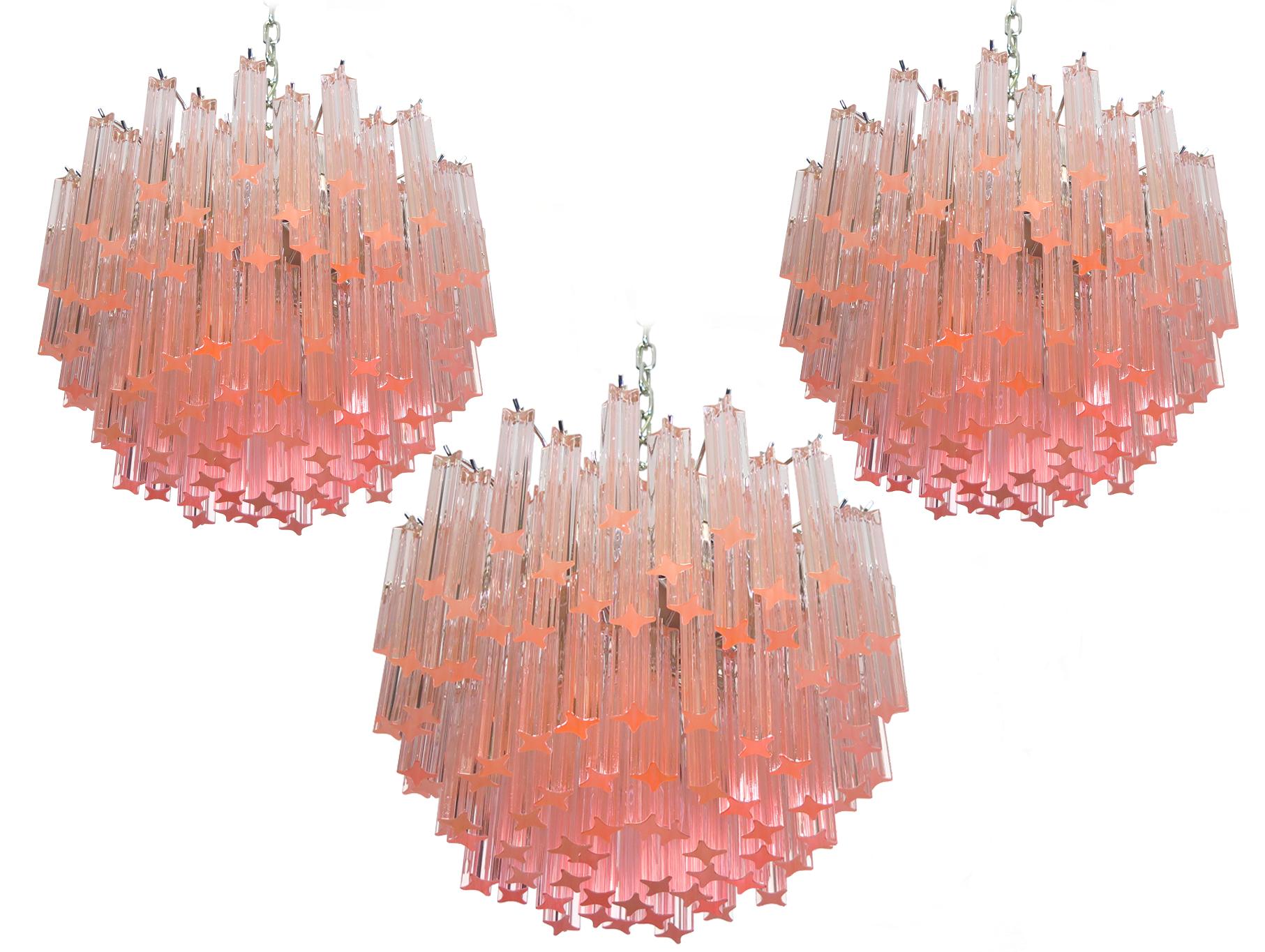 Fantastic vintage Murano chandelier made by 107 crystal prism quadriedri in a nickel metal frame. The glass has a slightly pink color.
Period: 1980s
Dimensions: 45.25 inches height (115 cm) with chain; 15.75 inches height (40 cm) without chain;