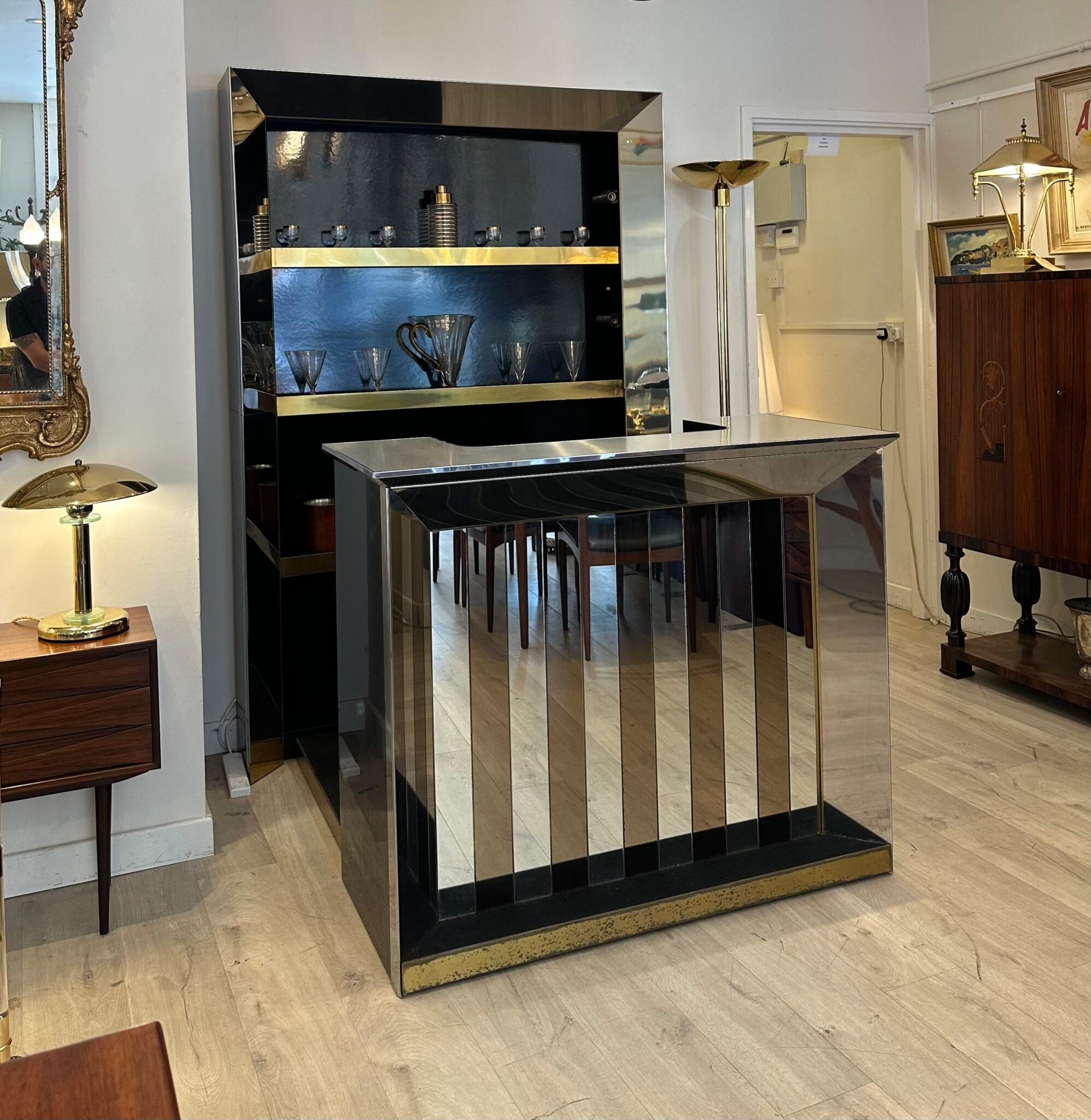 A large and extremely impressive vintage Italian chrome and brass bar cabinet. This was recently imported from Italy, it dates from the 1970’s.

It is of superb quality, it has a very stylish and glamorous design. The cabinet has chrome edges and