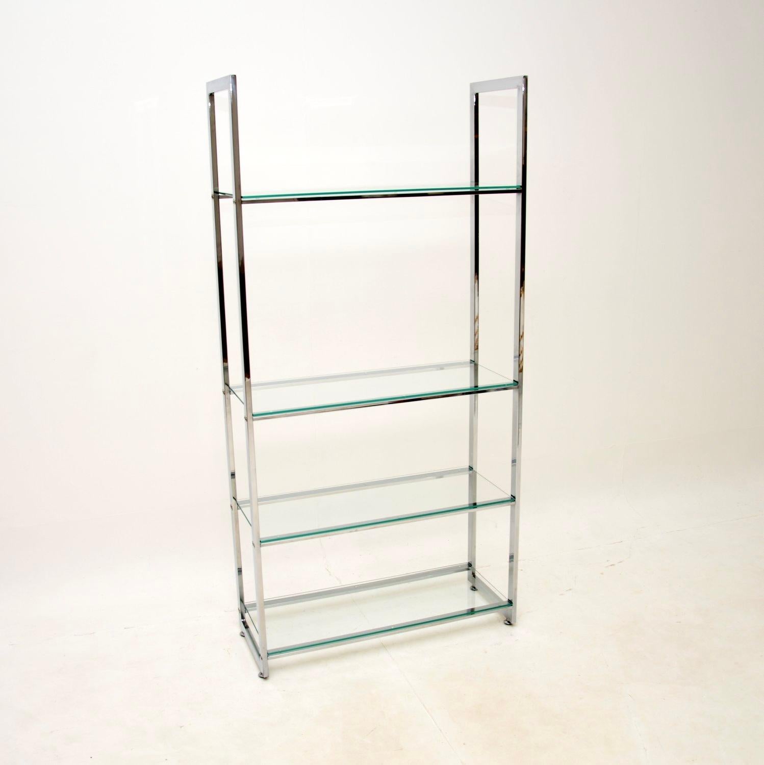 A very stylish vintage Italian chrome and glass bookshelf / display cabinet. This was made in Italy, it dates from the 1970’s.

It is of great quality, with a beautiful and useful design. The chromed steel frame has a lovely finish, it is identical