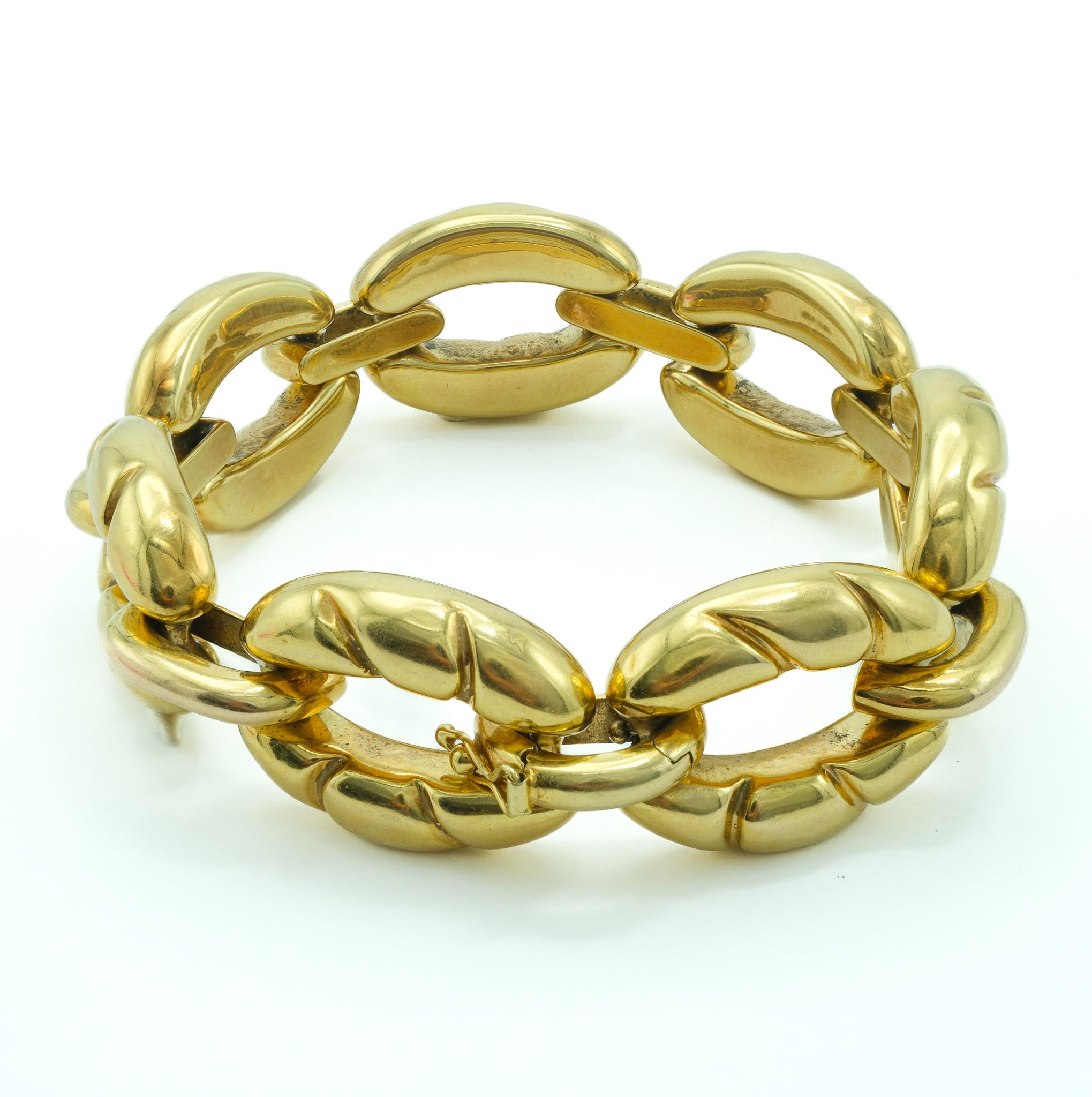 A testament to fine Italian craftsmanship, our 18 karat yellow gold chunky link bracelet is an exquisite statement piece that offers opulence and bold. 

Meticulously crafted, this bracelet is infused with character as each link is hand made and