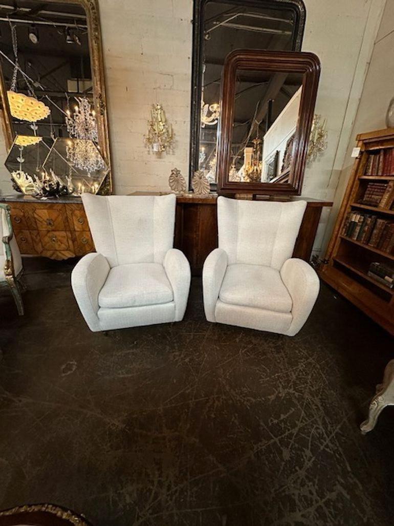 Pair of vintage Italian Art Deco high back designer club chairs after Gio Ponti. (new upholstery) Circa 1940. Perfect for today's transitional designs!