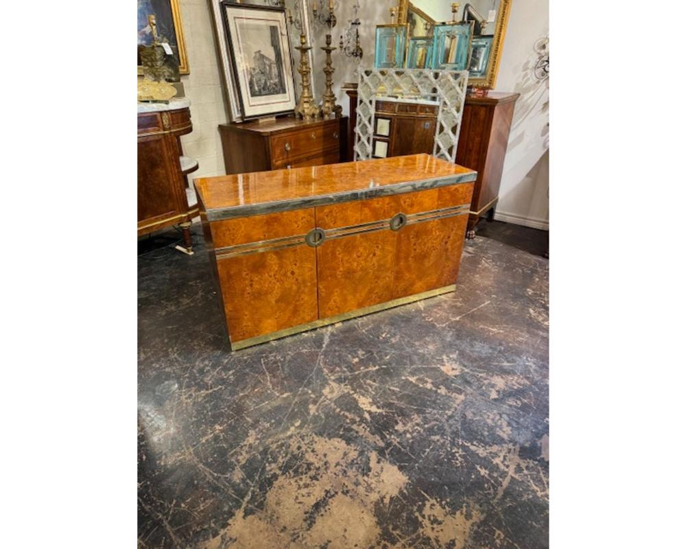 Vintage Italian burl walnut and brass credenza after designer Pierre Cardin. Circa 1970. Perfect for today's transitional designs!