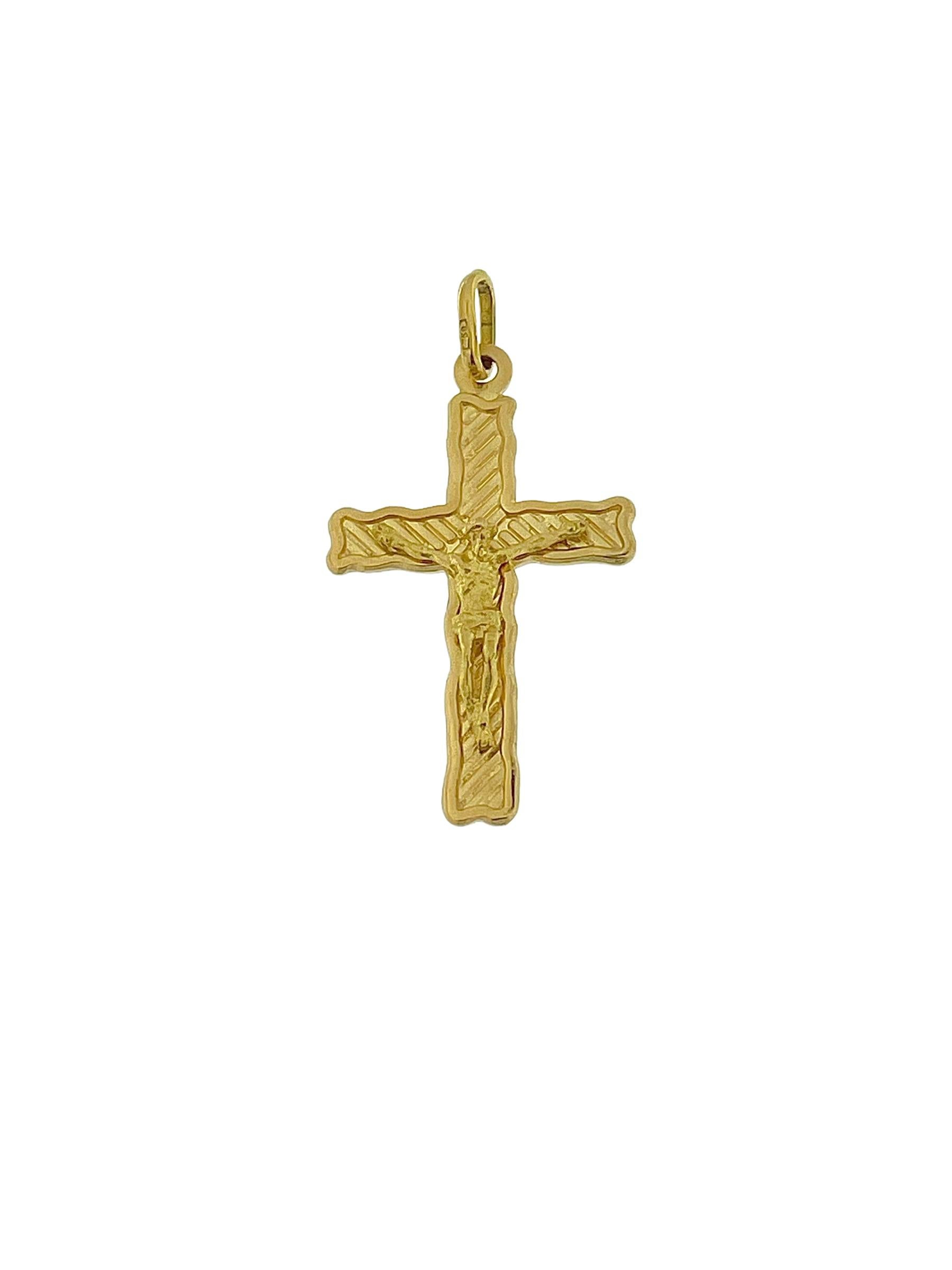 This Vintage Italian Crucifix is a remarkable piece of jewelry that exudes a sense of history and reverence. Crafted from luxurious 18-karat yellow gold, the crucifix features a satin finish that adds a subtle, elegant sheen to the piece.

The