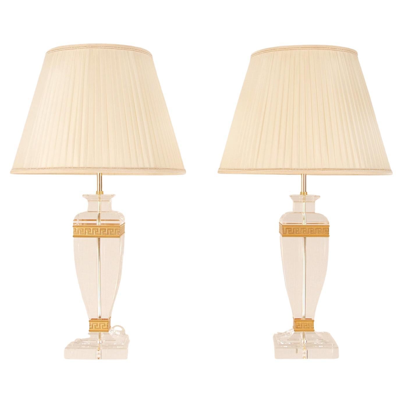 A pair tall Italian Versace style vase shaped table lamps
Made of gold gilded brass, bronze and acrylic
High end quality lamps
Colors: Gold and clear
Style midcentury Hollywood Regency, neoclassical, Charles Hollis Jones, Versace
Origin Italy