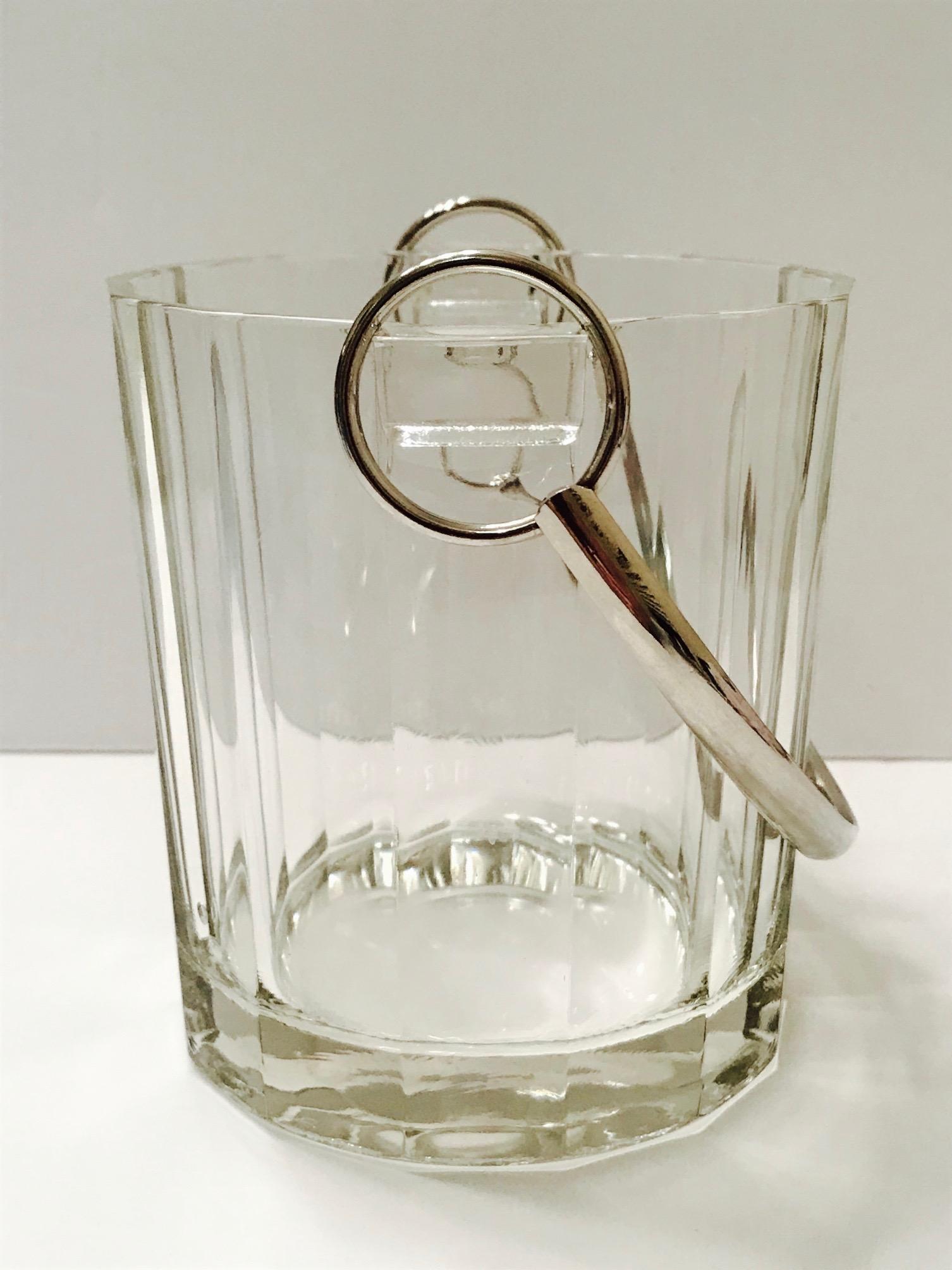 Italian Mid-Century Modern faceted glass ice bucket with blown glass handles and fitted with stylized horse bit handle in polished nickel. Signed ITALY on the underside, see last image.