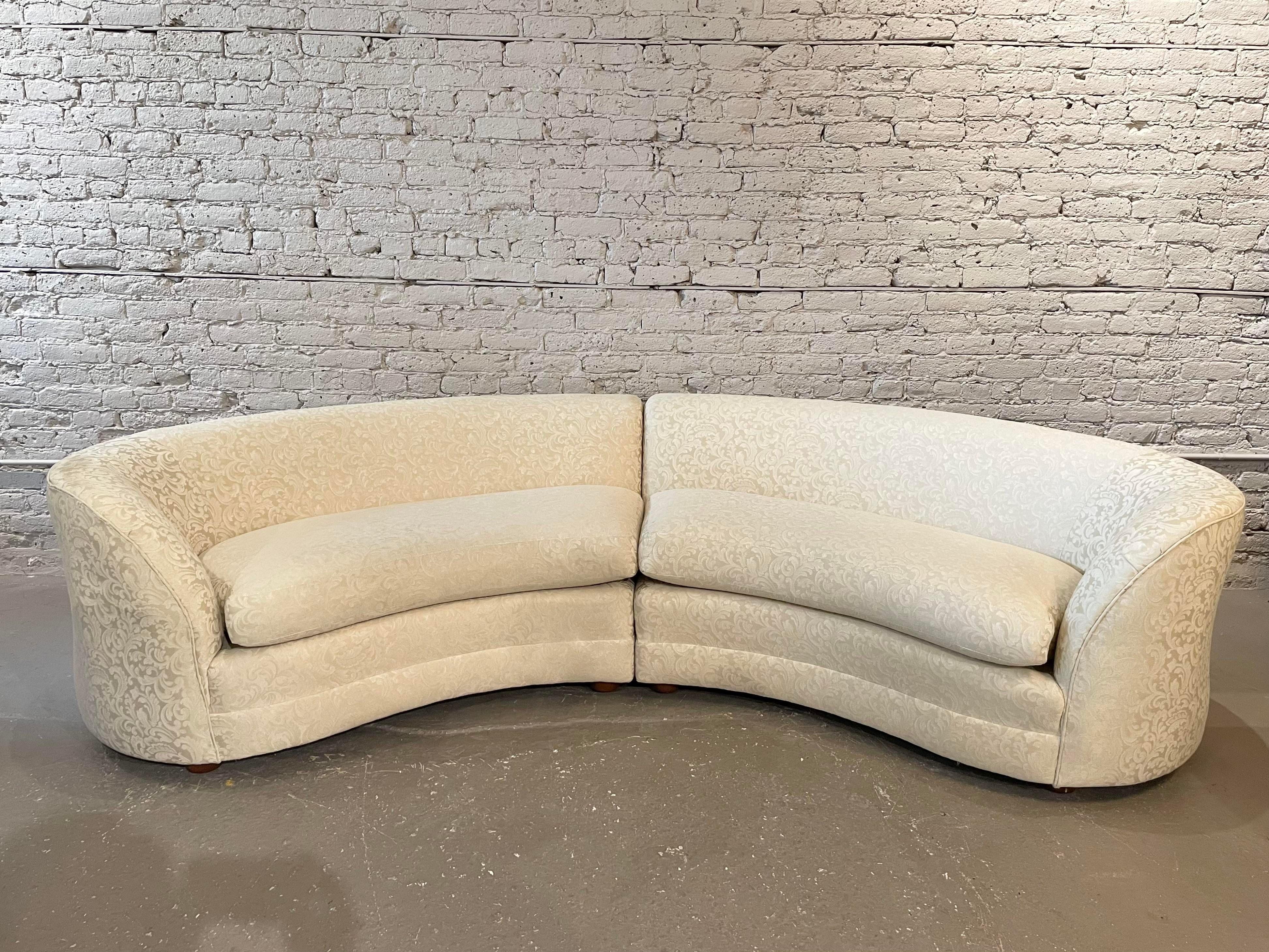 Beautiful and comfortable curved sofas custom made in Italy. Please get in touch if you would like to purchase just one.
The fabric is in good/excellent condition and can be used as is.
The seat depth is 22”. The total depth, including the curve