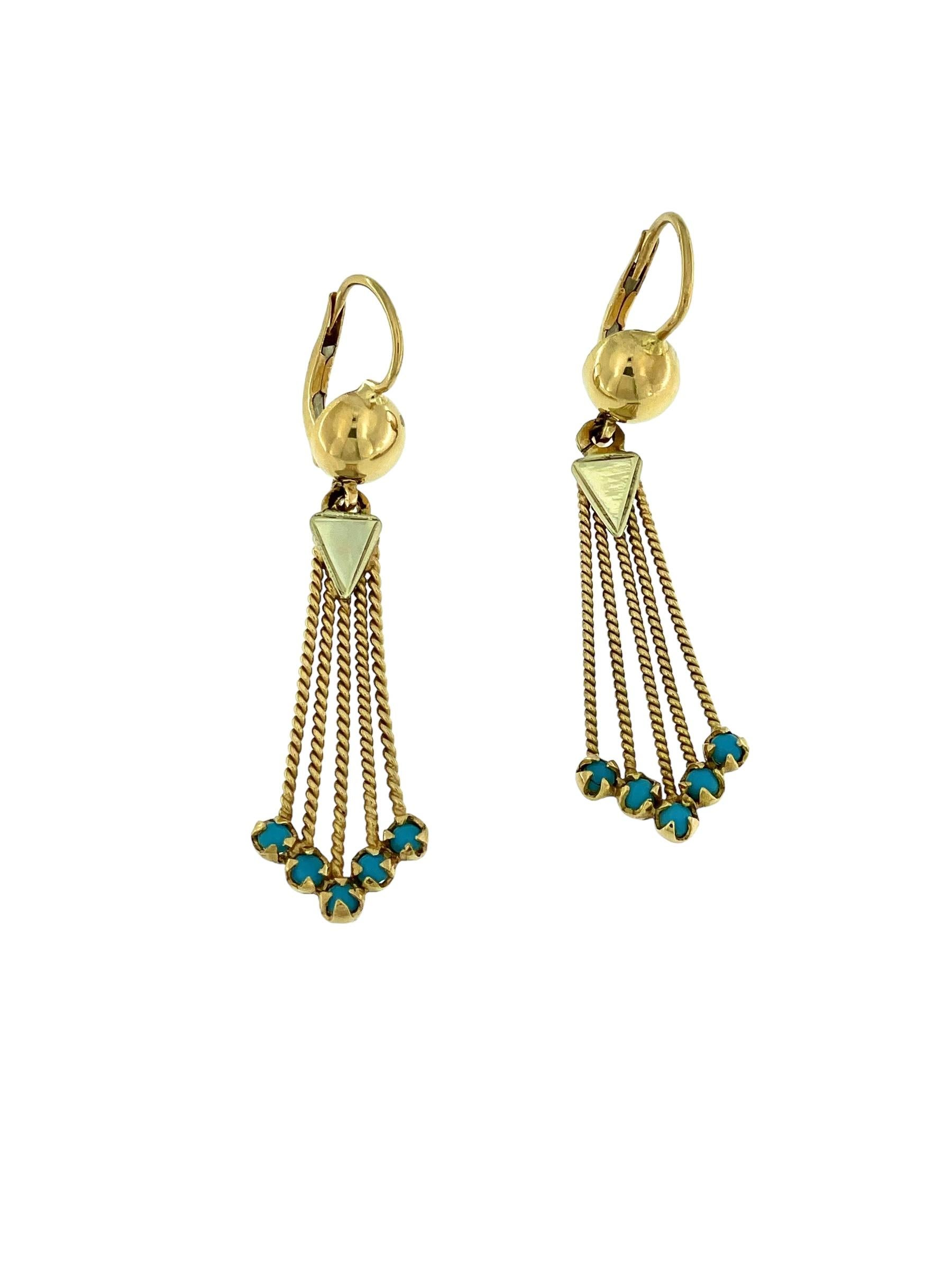 The Vintage Italian Dangle Earrings in Gold and Turquoise are a captivating blend of artistry and elegance, embodying the charm of vintage Italian jewelry design. Crafted from luxurious 18kt yellow and white gold, these earrings feature intricate