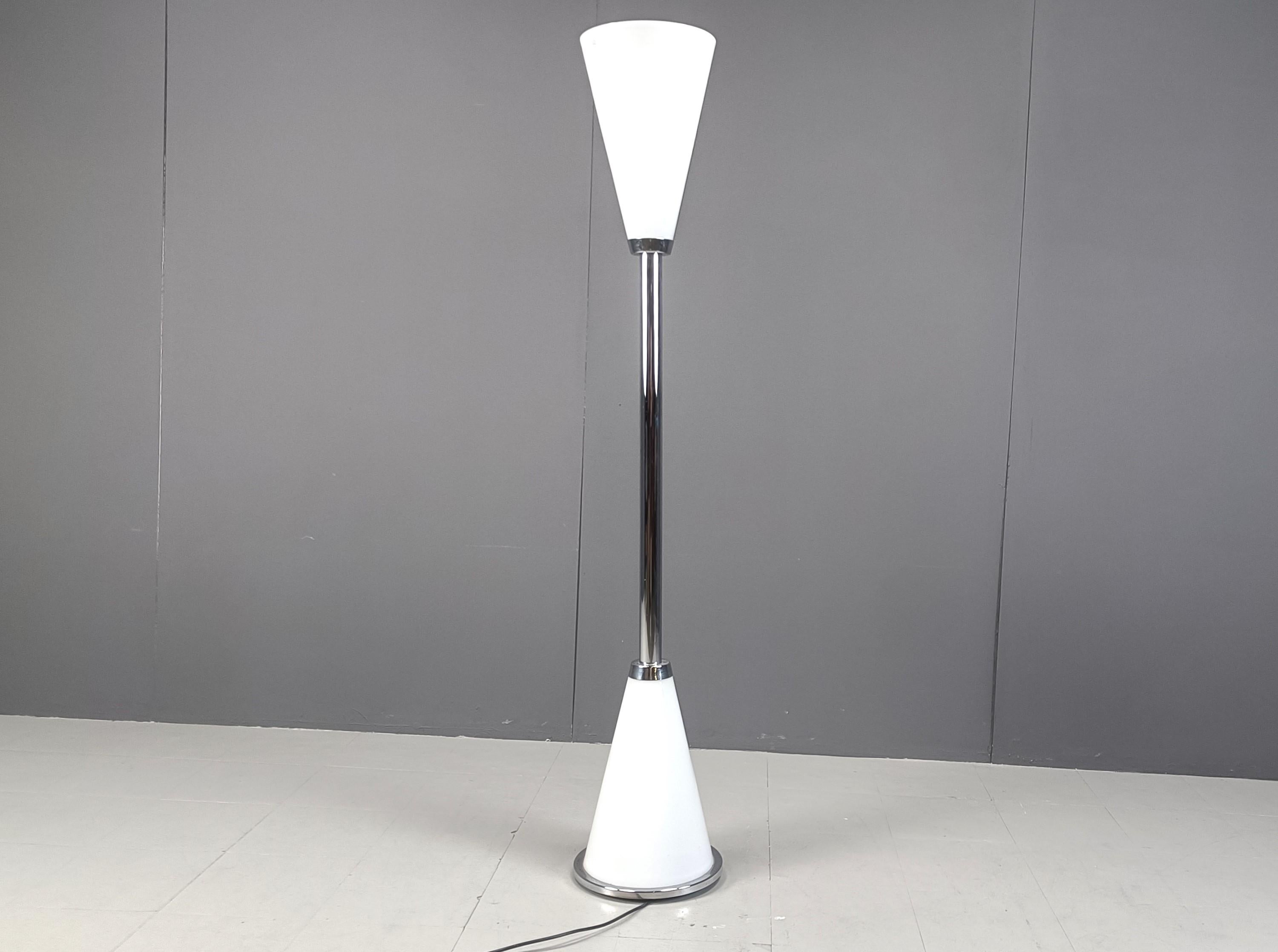 
Vintage chrome and milk glass 'diabolo' design floor lamp.

Beautiful timeless design.

The top and bottom shades can be lit individually.

Labeled Studio Design Italia

Tested and ready to use.

1970s - Italy

Dimensions:
Height: 182cm
Diameter: