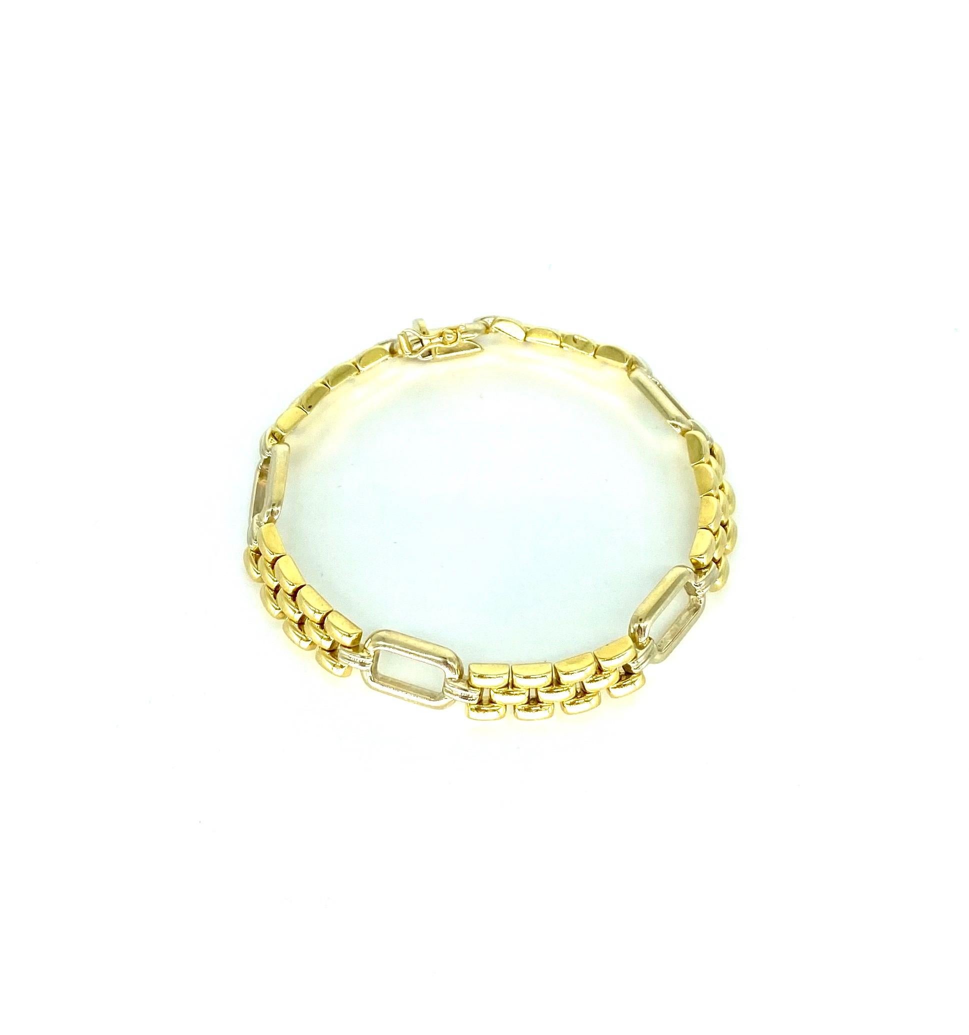 Vintage Italian Designer Fancy 2-Tone Link Bracelet 18k Gold. Beautiful crafted bracelet in both white gold and yellow gold throughout. Open frame design and special links across the entire bracelet making it standout significantly. The Bracelet