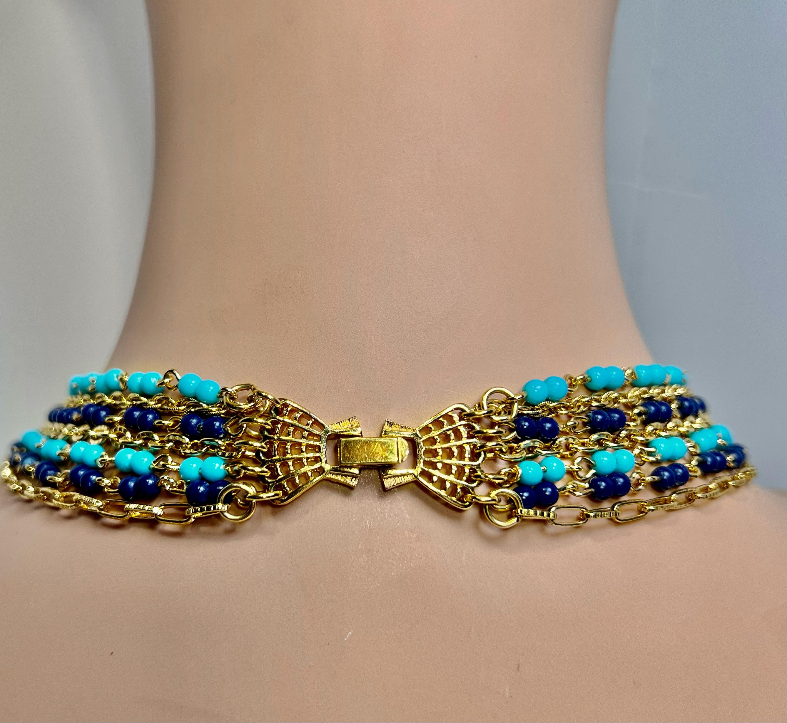 Vintage Italian Designer Turquoise Lapis Vermeil Seven Multi Chain Necklace

Italian 1960s Elegant Seven Multi-Chain Beautiful Design Clasp Vermeil Necklace A rich gold vermeil, high karat gold 18-chain necklace with a wonderfully designed clasp.