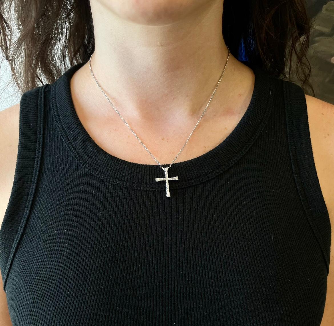 Vintage Italian Diamond 18 Karat White Gold Cross Necklace. The pendant features 20 Round Brilliant Cut diamonds, approximately 0.60 carat, G color. Circa 2000's. The length is 16 inches.

About The Piece: There is no better symbol of your faith,