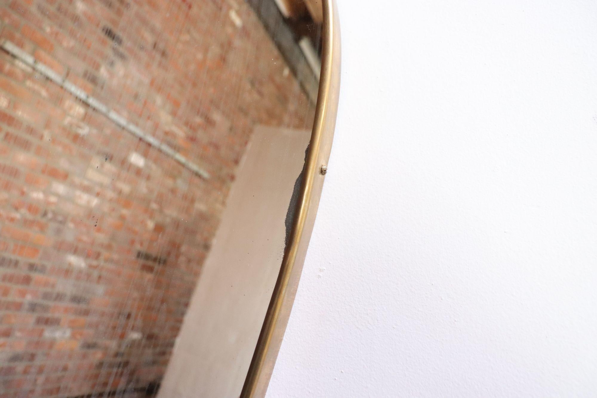 Miroir mural oblong italien vieilli avec cadre en laiton d'après Gio Ponti en vente 12