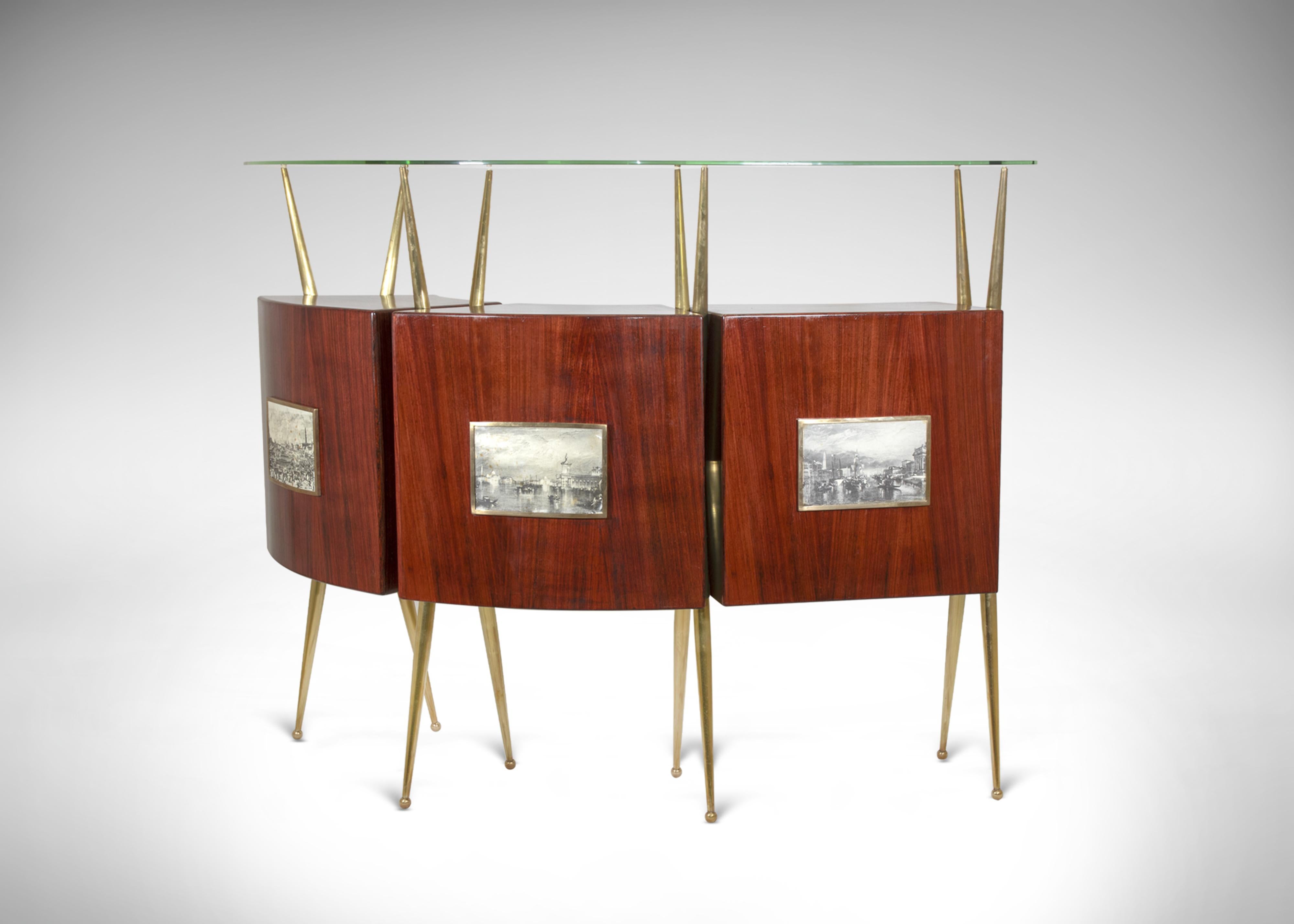 Vintage Italian dry bar is a midcentury design modern Italian bar in the style of Gio Ponti, circa 1950s.

This beautiful bar cabinet consists of one high wall-console, one curved serving cabinet, and two brass stools with white moleskin seats both