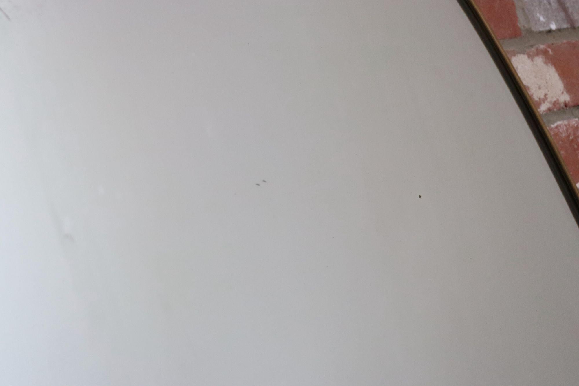 Miroir mural elliptique italien vintage avec cadre en laiton d'après Gio Ponti en vente 7