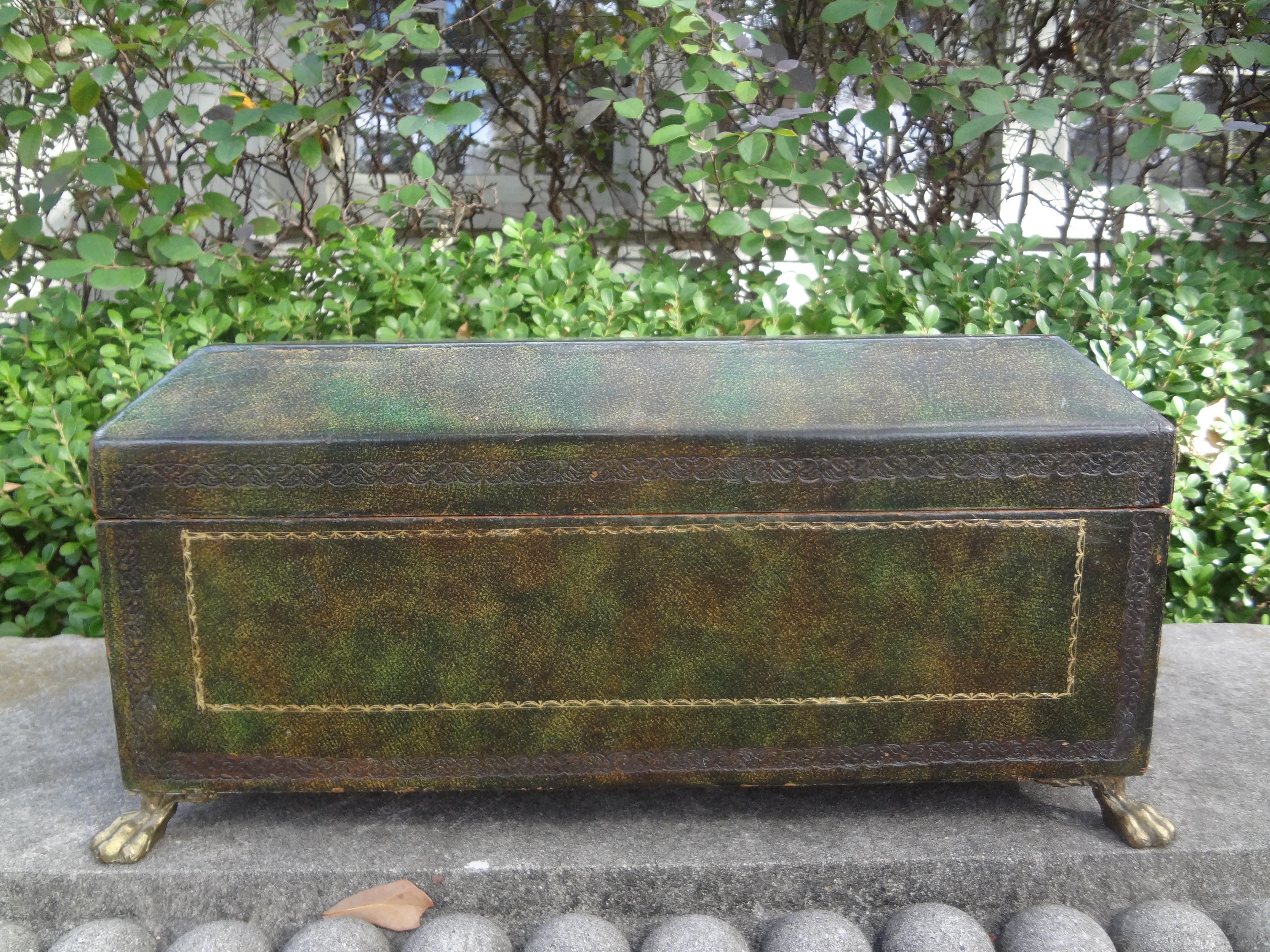 Vintage Italian Embossed Leather Box With Paw Feet.
Handsome large Italian green leather box with hand tooled gilt embossing and bronze paw feet.
Great decorative accessory for a coffee table, desk or office.
