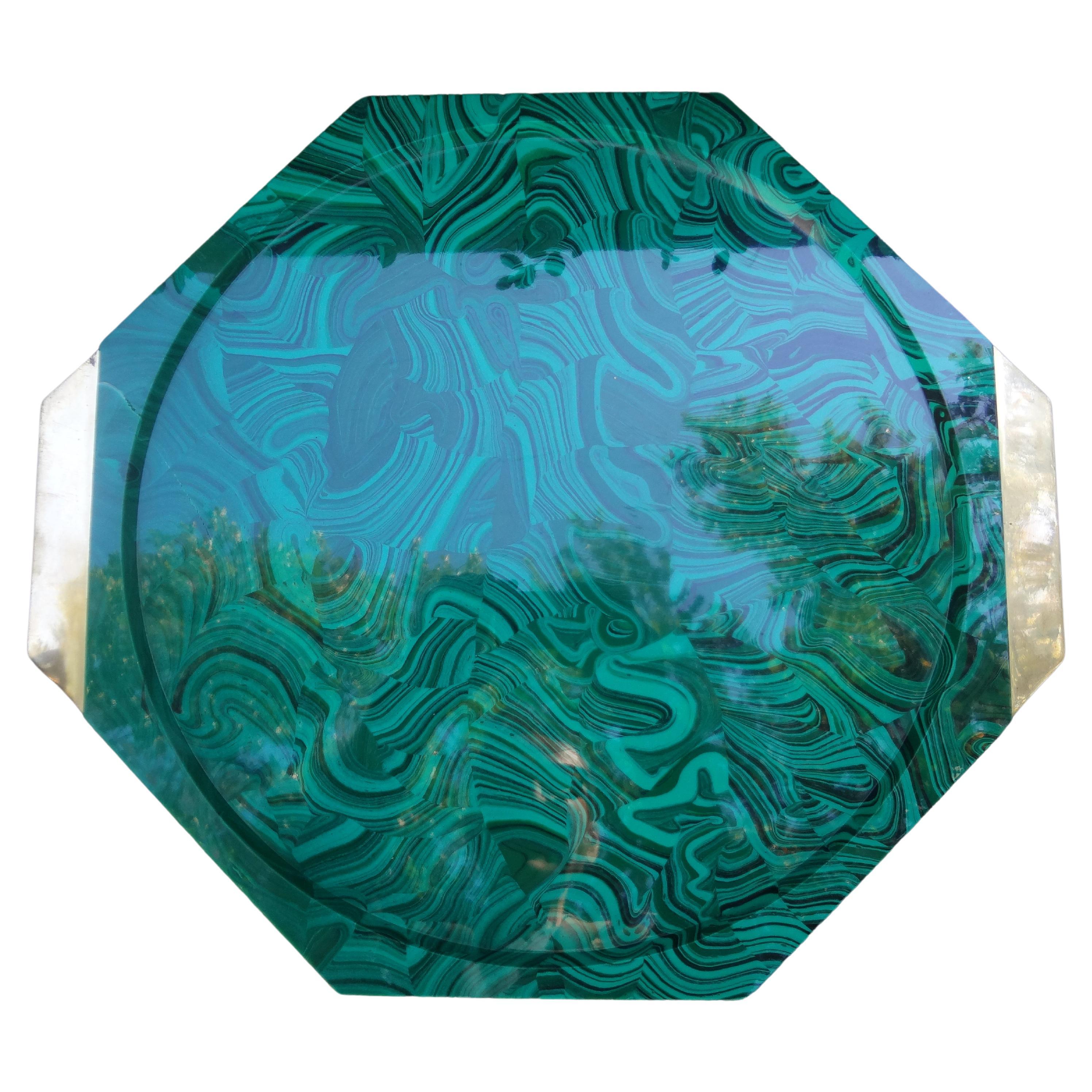 Vintage Italian faux malachite tray. This stunning Hollywood Regency octagonal tray has a beautiful faux malachite finish and brass handles. The perfect serving tray, coffee table tray, powder room tray or vanity tray.
Stunning!