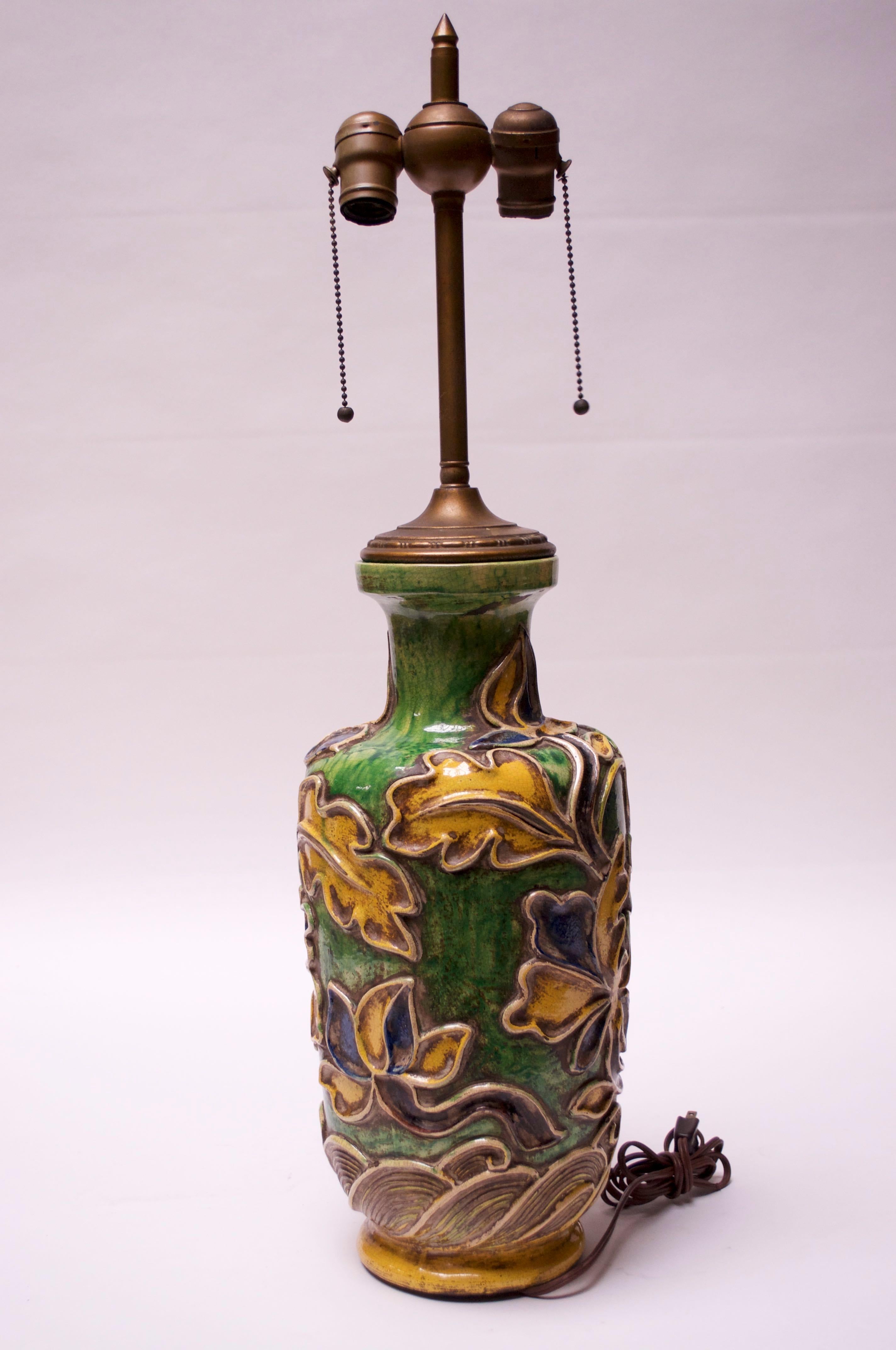 Early and rare example (1930s) from ceramicist, Ugo Zaccagnini, composed of a floral or petal motif in vibrant green, blue, and yellow with brass double socket, stem and finial. Nice, original condition with only minor wear consistent with age and