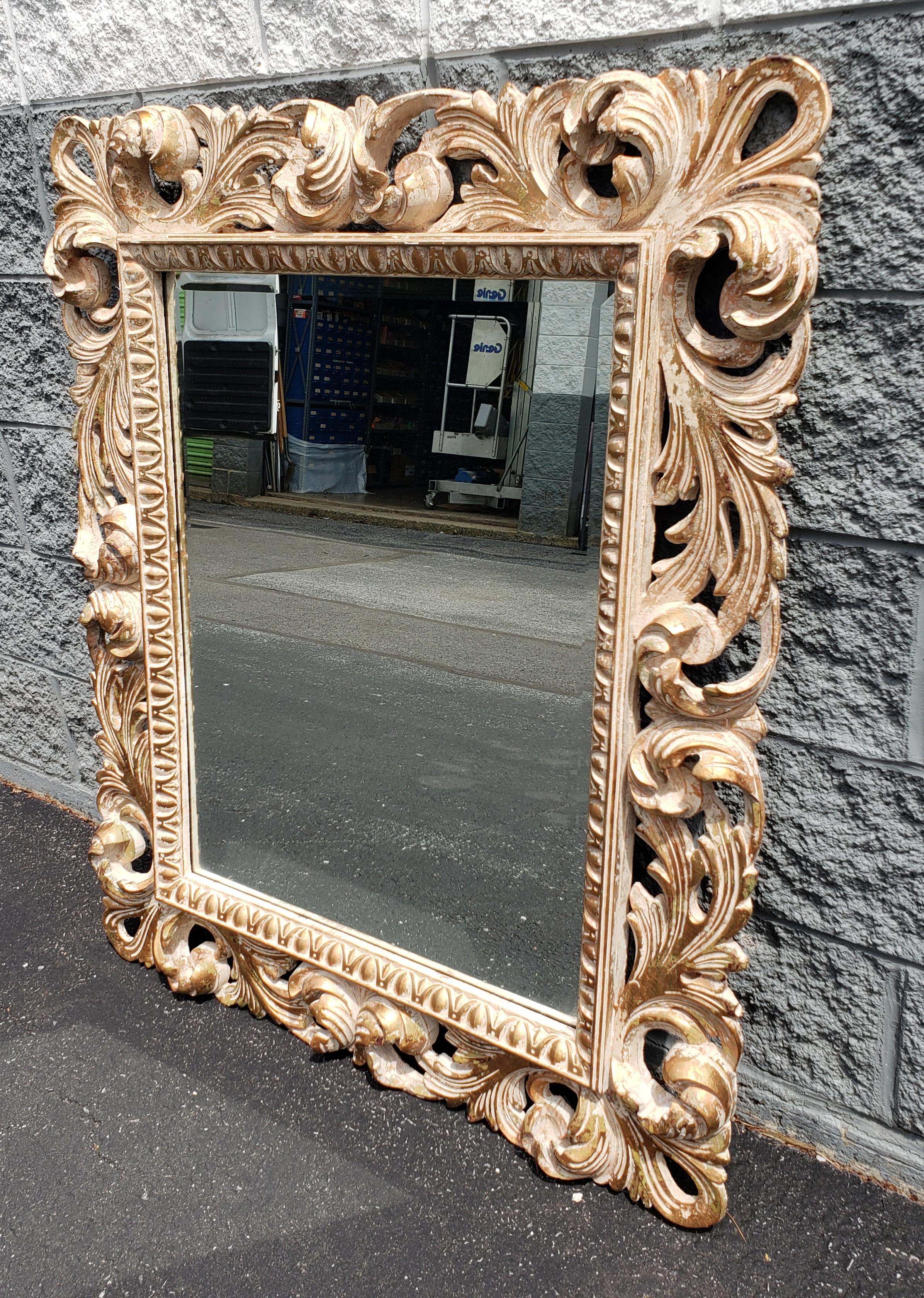 Absolutely gorgeous neoclassical Italian Florentine ornate mirror with intricate carvings.
 
Measures 36