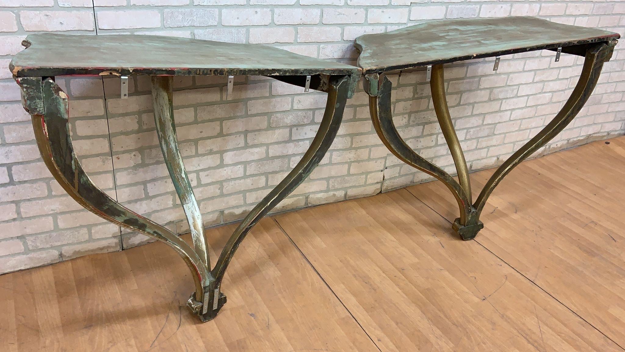 Vintage Italian Florentine Gilt Wall Hanging Demilune Console Shelf Table - Pair

Vintage Italian wall mounted side console tables/shelves. Made in Italy they have Gilt Florentine finish with its natural patina.

circa: 1950

Dimensions:
H: