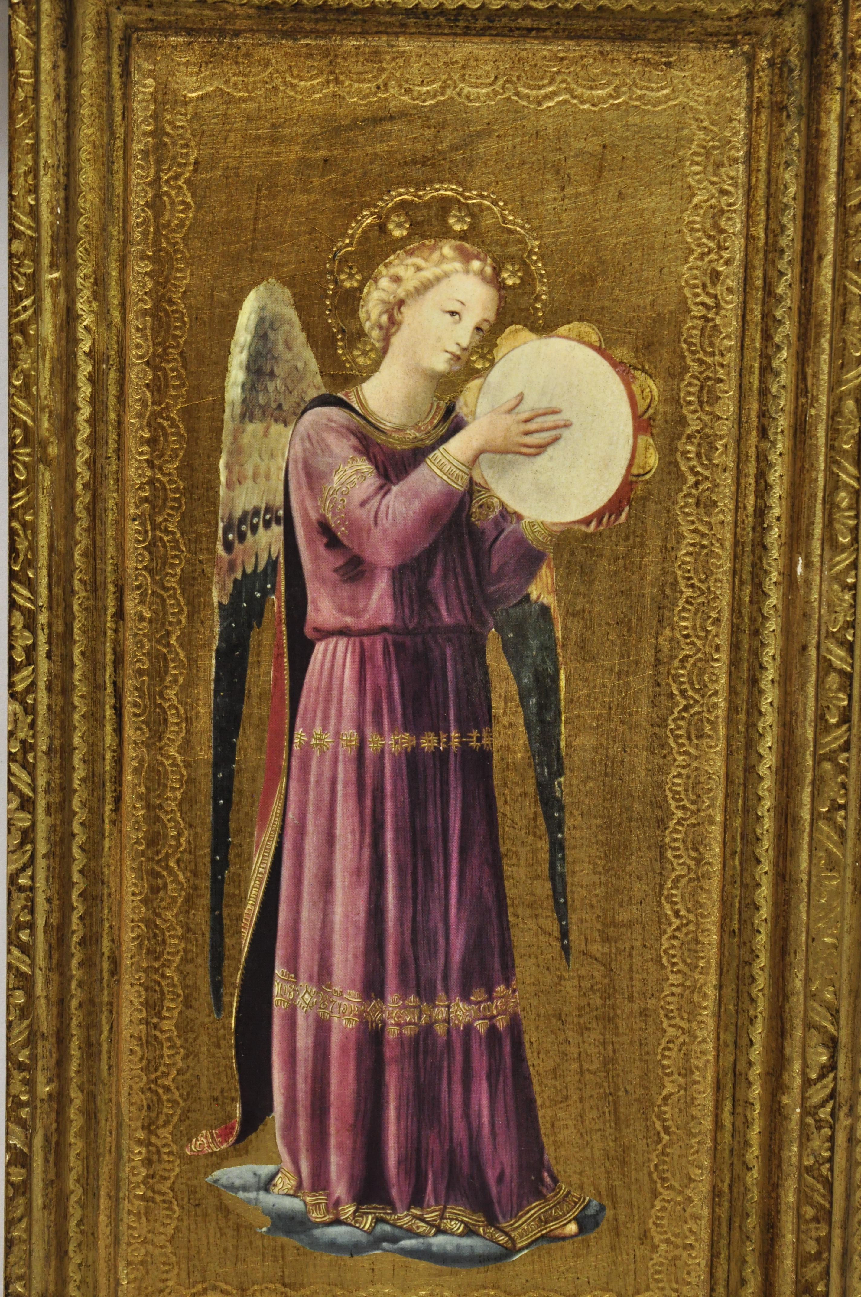 Vintage Italian Florentine gold giltwood 16 x 26 musical Angels mirror by Exposures. Item features gold leaf finish, 2 musical angels, solid wood frame, original label, very nice vintage item, great style and form, circa 1997. Measurements: 16.25
